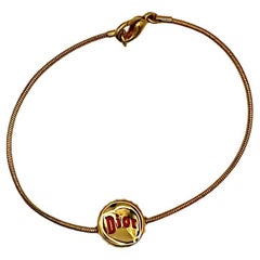 CHRISTIAN DIOR Bracelet vintage à motif de bouchon de bouteille en or