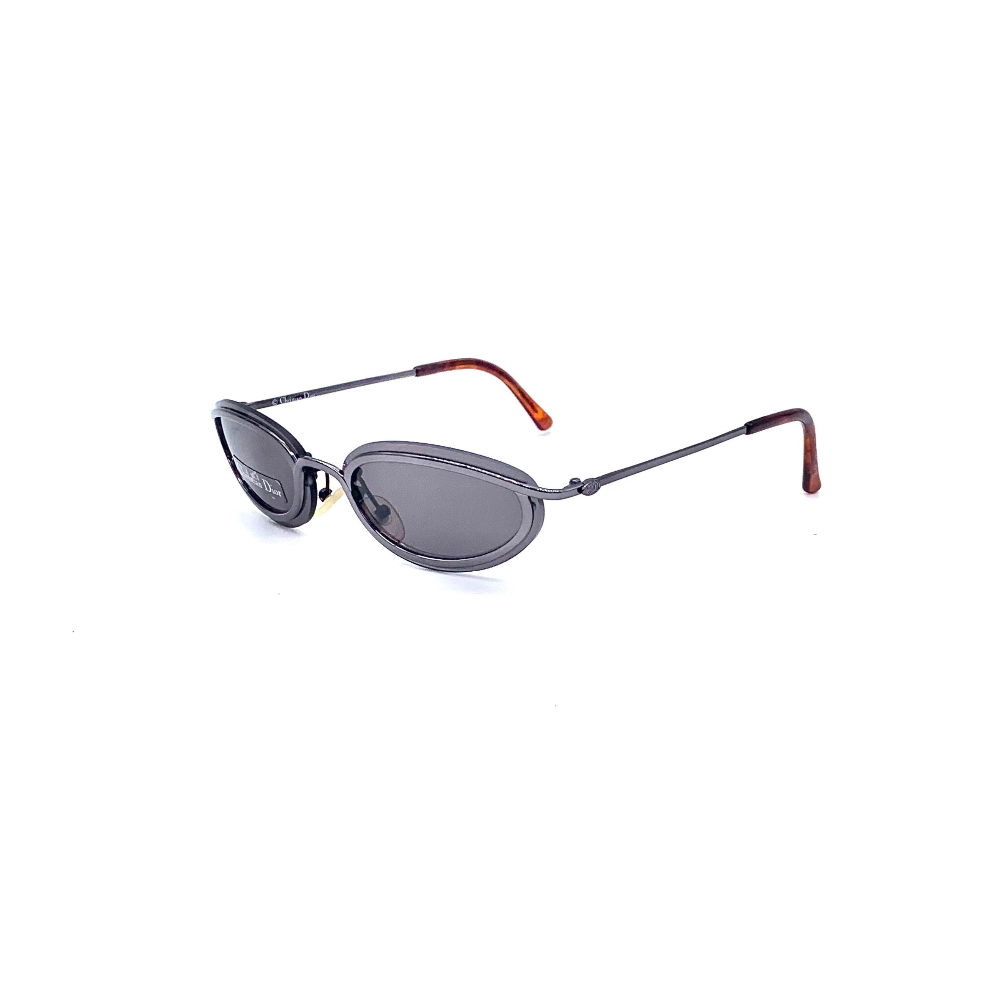 These vintage Christian Dior sunglasses feature a chic oval frame, overlaid with a unique chromatic silver metal structure. An iconic style from the 90s, these sunglasses will add a classic look to any outfit.
Inclusion: Original Case.