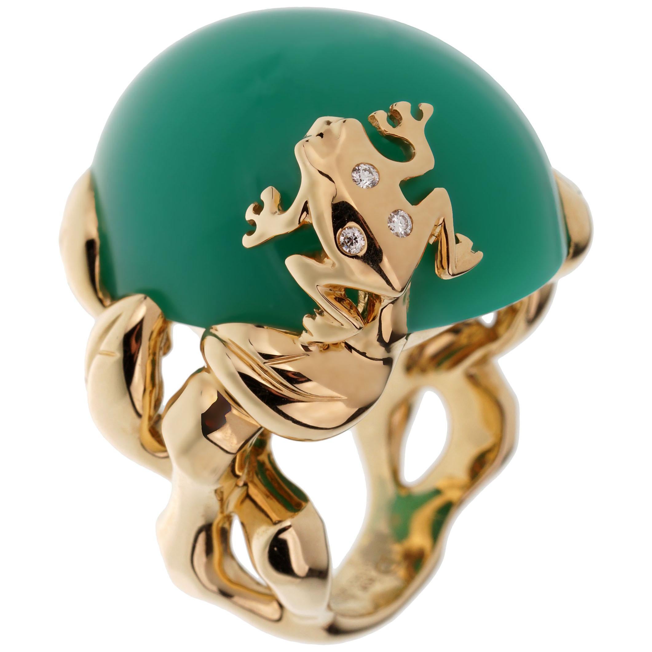 A stunning Dior cocktail ring showcasing a 40ct Chrysoprase wrapped in shimmering 18k yellow gold adorned with a frog motif set with 3 of the finest round brilliant cut diamonds. 

$24,200 retail