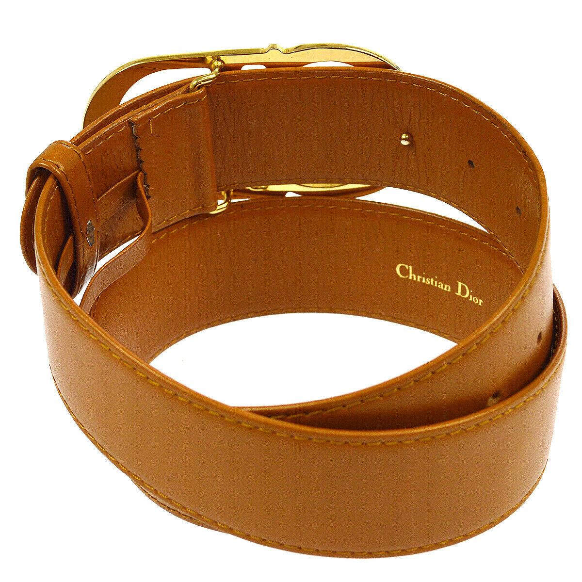 Christian Dior Cognac Leather Gold Large 'CD' Logo Waist Belt

Leather
Metal
Gold tone
Peg closure
Width 1.75