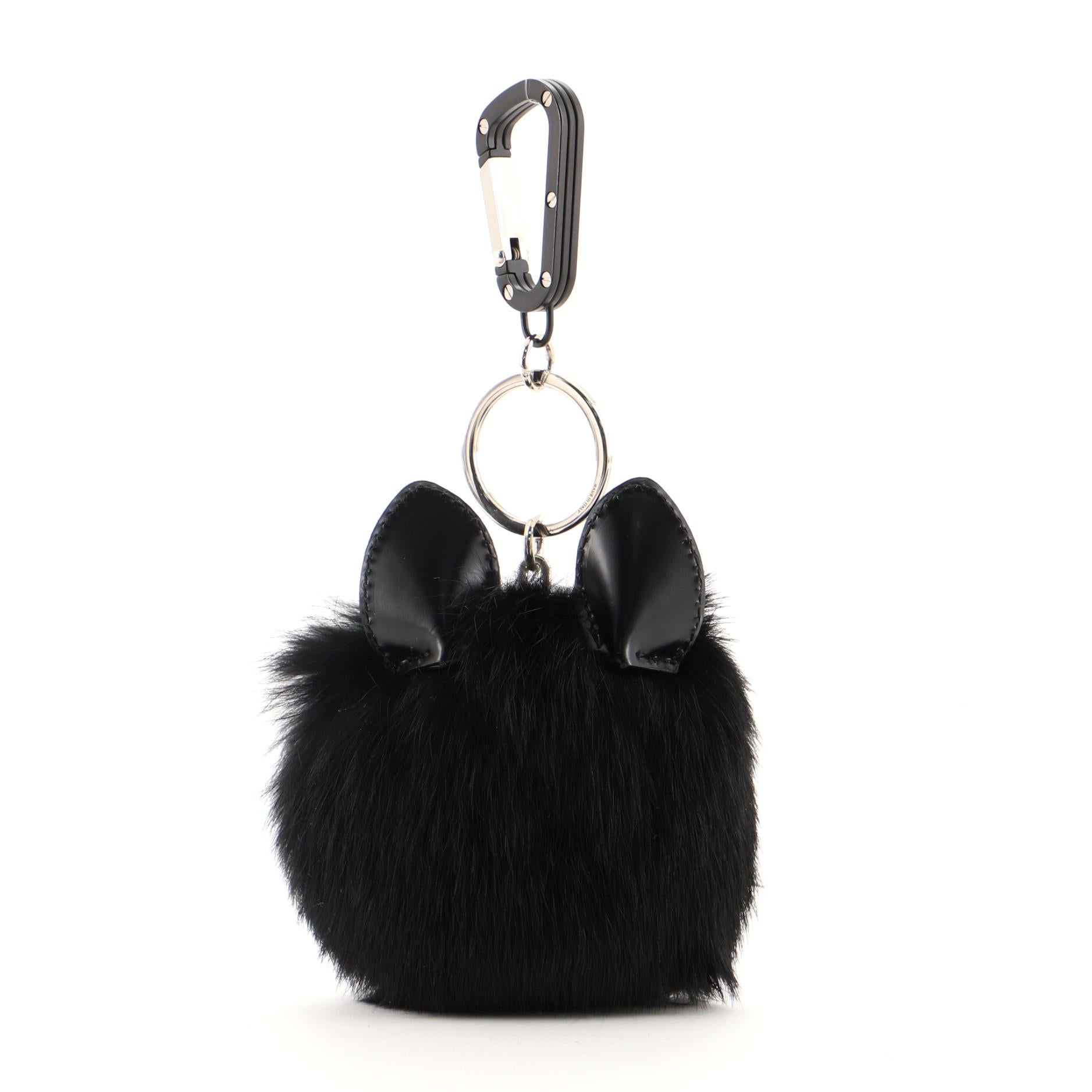 Christian Dior Cookie Bag Charm Leather and Fur
Black

Condition Details: Light scuffs and indentations on leather trims, scratches on hardware.

50962MSC

Height None