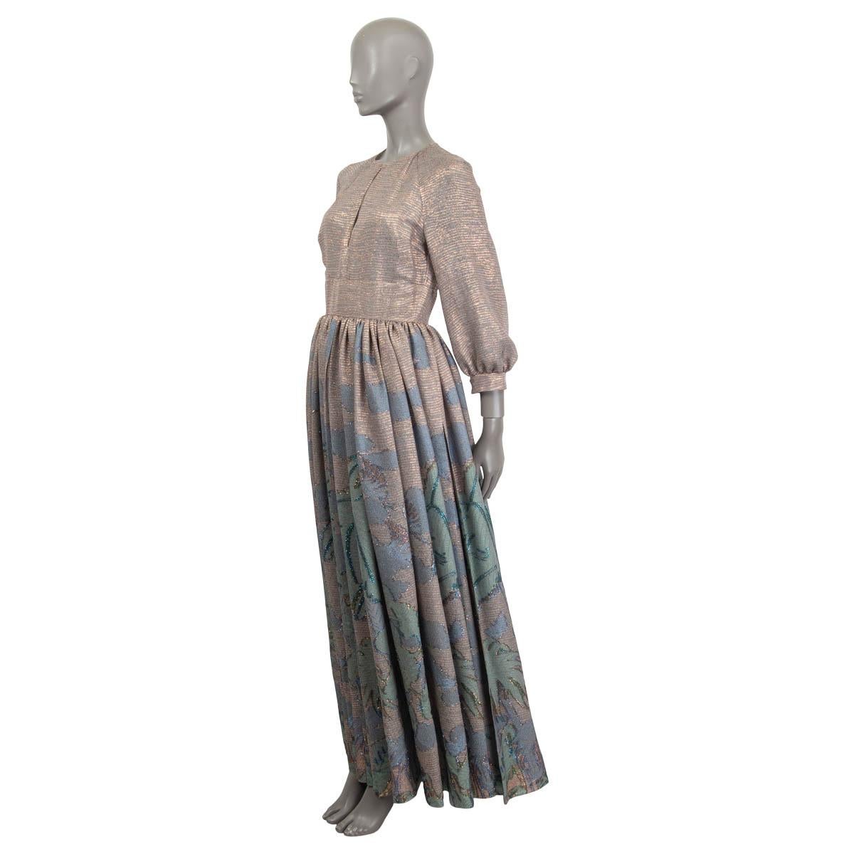 100% authentic Christian Dior Resort 2020 keyhole lurex maxi dress in copper, green and blue silk (66%) and polyester (34%). Features long raglan sleeves (sleeve measurements taken from the neck) and buttoned cuffs. Opens with a hook and a concealed