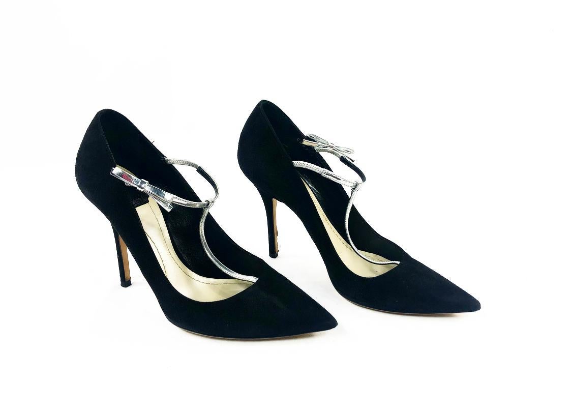 Christian Dior COQUETTE Pump 10mm Black Suede w/ Silver Leather Bow Size 38

Product details:
The shoes come with the original Dior box.
Point toe
Black suede w/ silver metallic leather stretchable strap w/ bow detail on the sides.
Size 38
The heel