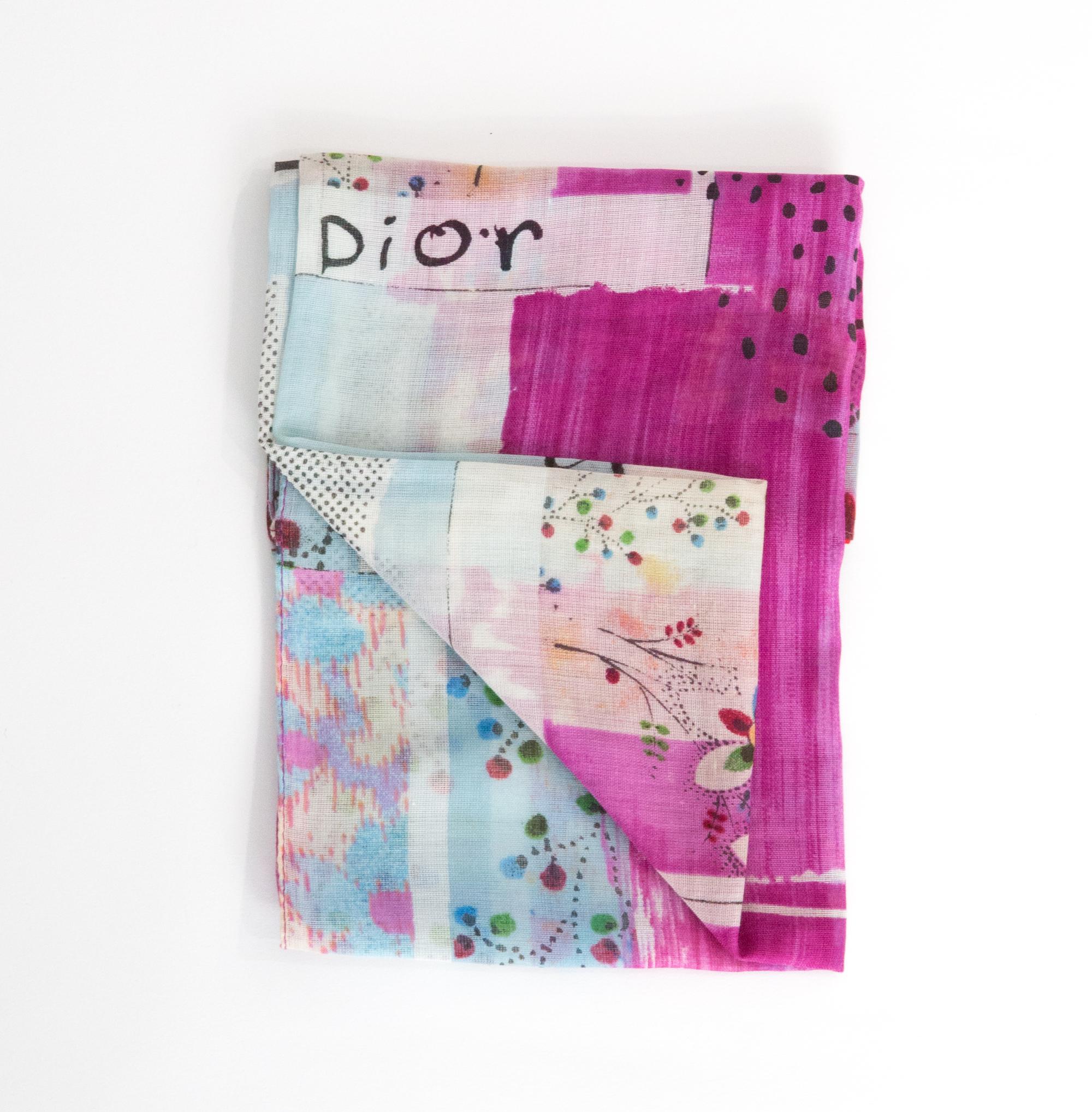 Christian Dior multicolor cotton Scarf featuring a patch of prints, and a top logo signature. 
100% cotton. 
Circa 2000s
In good vintage condition. Made in France.
22in. (56 cm)  X 22in. (56 cm)
We guarantee you will receive this  iconic item as
