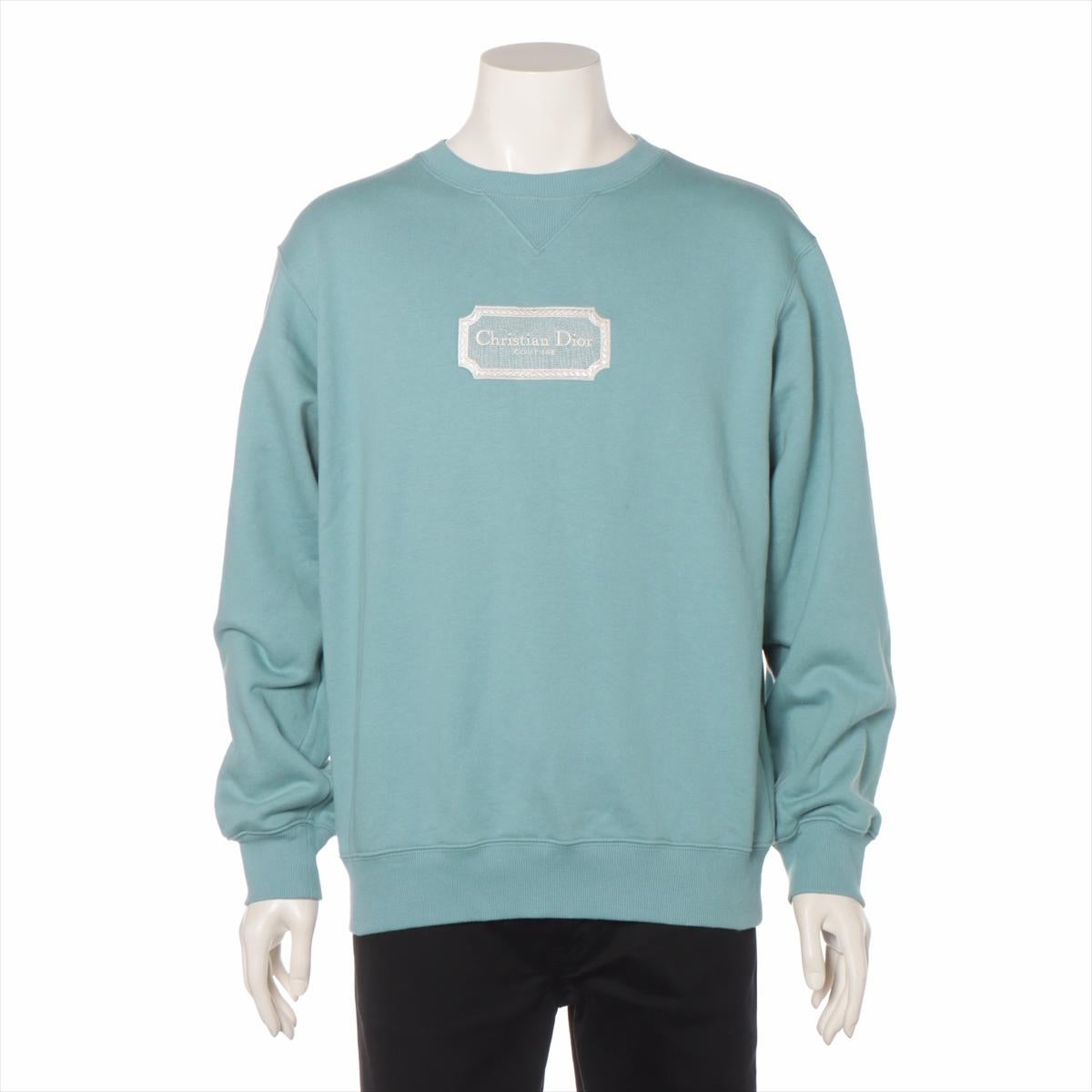 The Christian Dior Couture Sweatshirt in Blue is a luxurious and stylish piece that blends casual comfort with high-fashion elegance. Crafted from premium materials, the sweatshirt features a rich blue hue that adds a touch of sophistication to