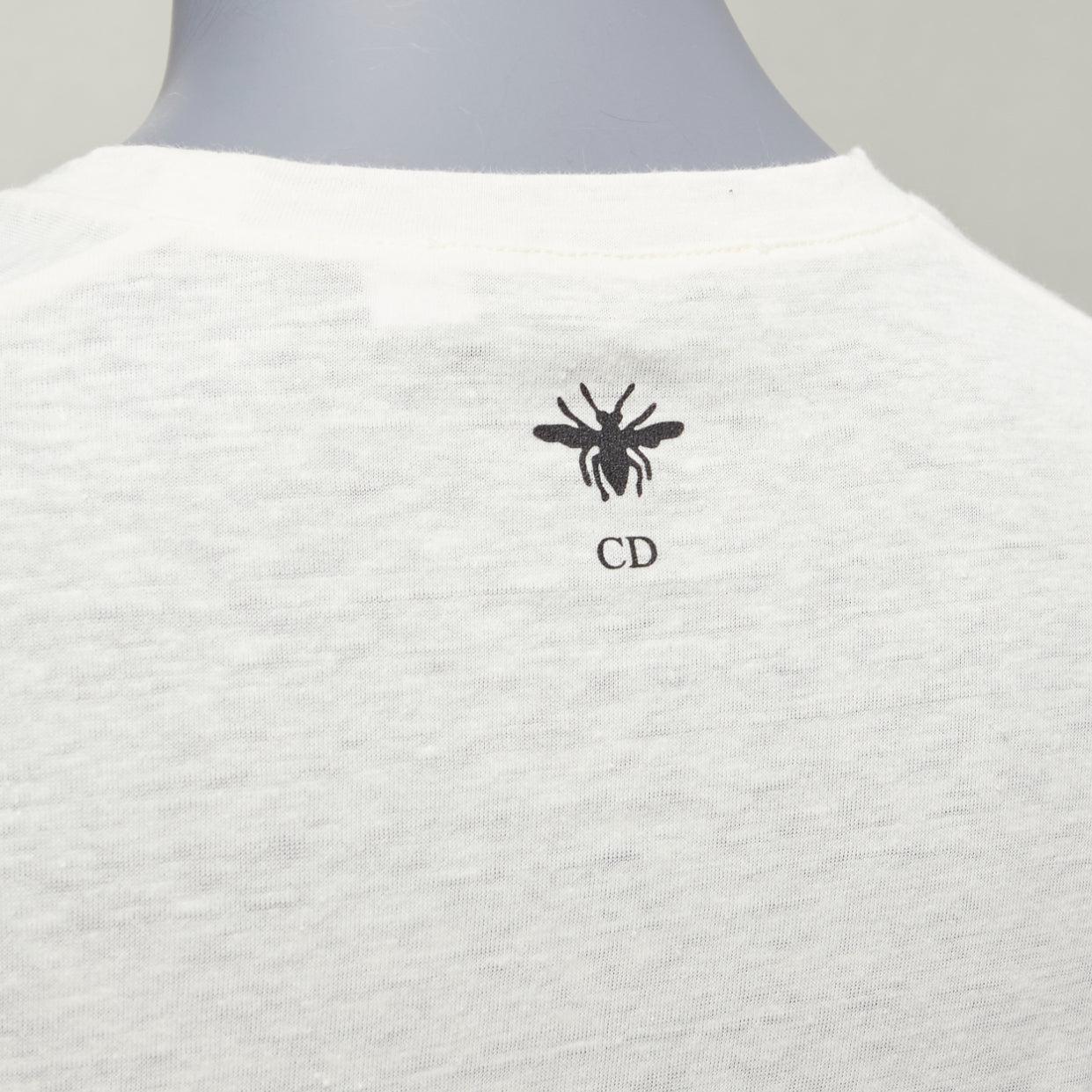 CHRISTIAN DIOR cream cotton linen brutal journey of the heart crew tshirt S
Reference: AAWC/A00788
Brand: Dior
Material: Linen
Color: Cream, Multicolour
Pattern: Abstract
Closure: Pull On
Extra Details: CD bee logo at back.
Made in: