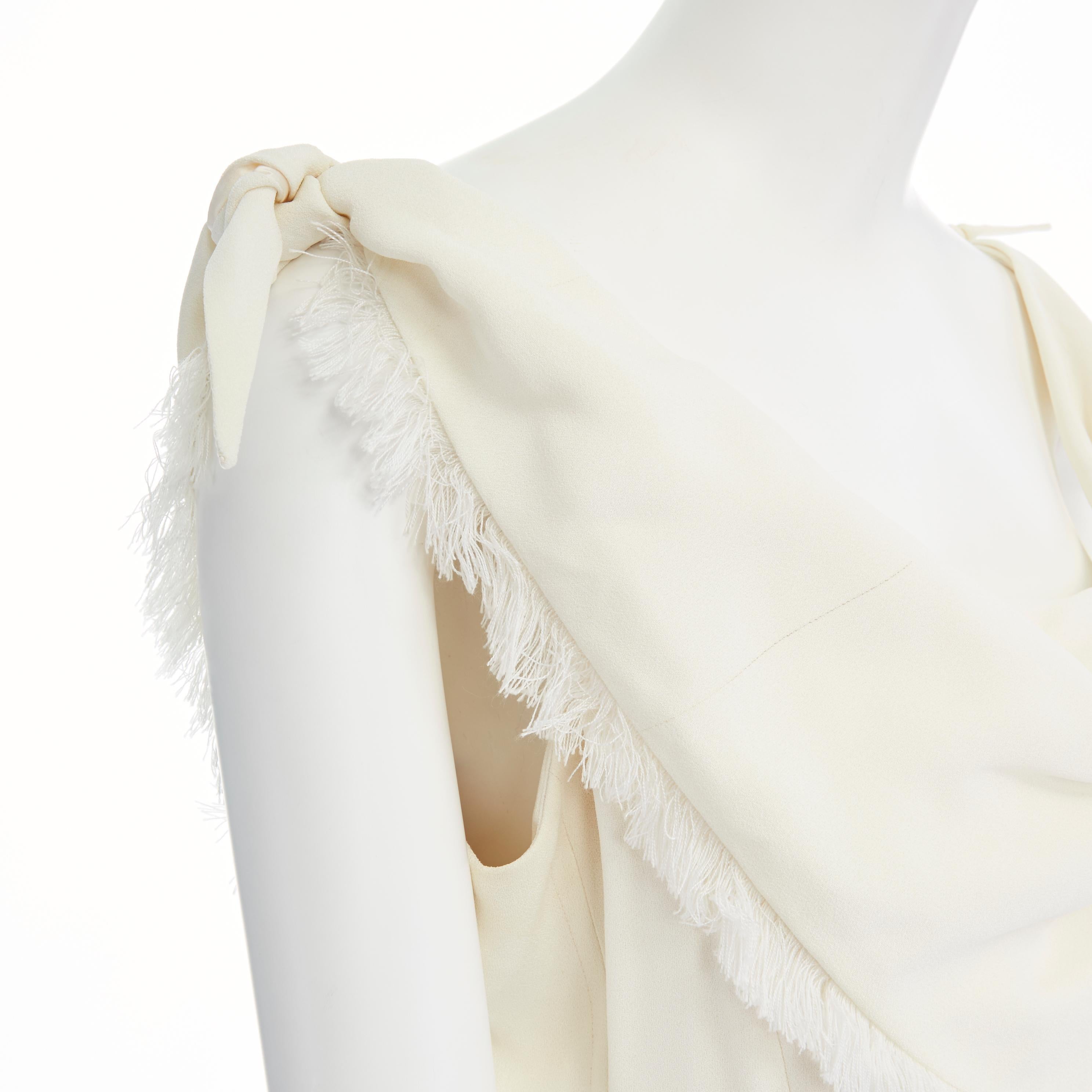 CHRISTIAN DIOR cream crepe fringe trimmed draped scarf tie strap dress FR40 L
Brand: Christian Dior
Designer: Christian Dior
Model Name / Style: Neckerchief dress
Material: Acetate, viscose 
Color: White
Pattern: Solid
Closure: Zip
Extra Detail: