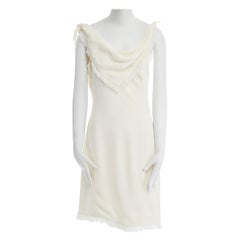 Christian Dior, abito in crêpe crema con frange e sciarpa drappeggiata con cinturino FR40 L