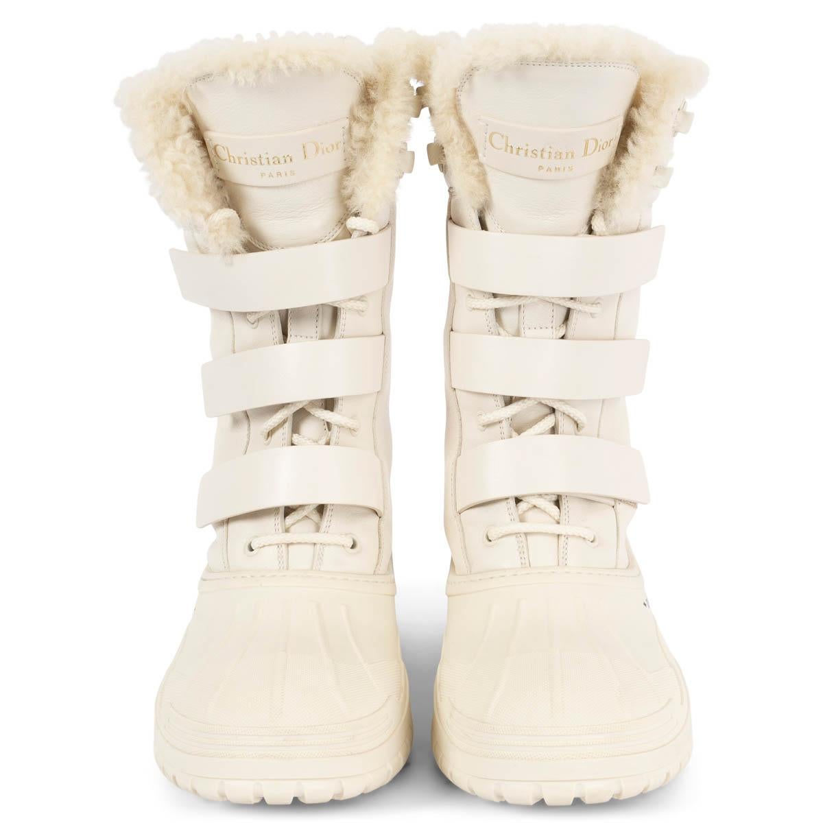100% authentic Christian Dior D-Venture lace-up combat snow boots in ivory leather and rubber with velcro closure. Fully lined in shearling. Have been worn once and are in virtually new condition. 

Measurements
Imprinted Size	39.5
Shoe