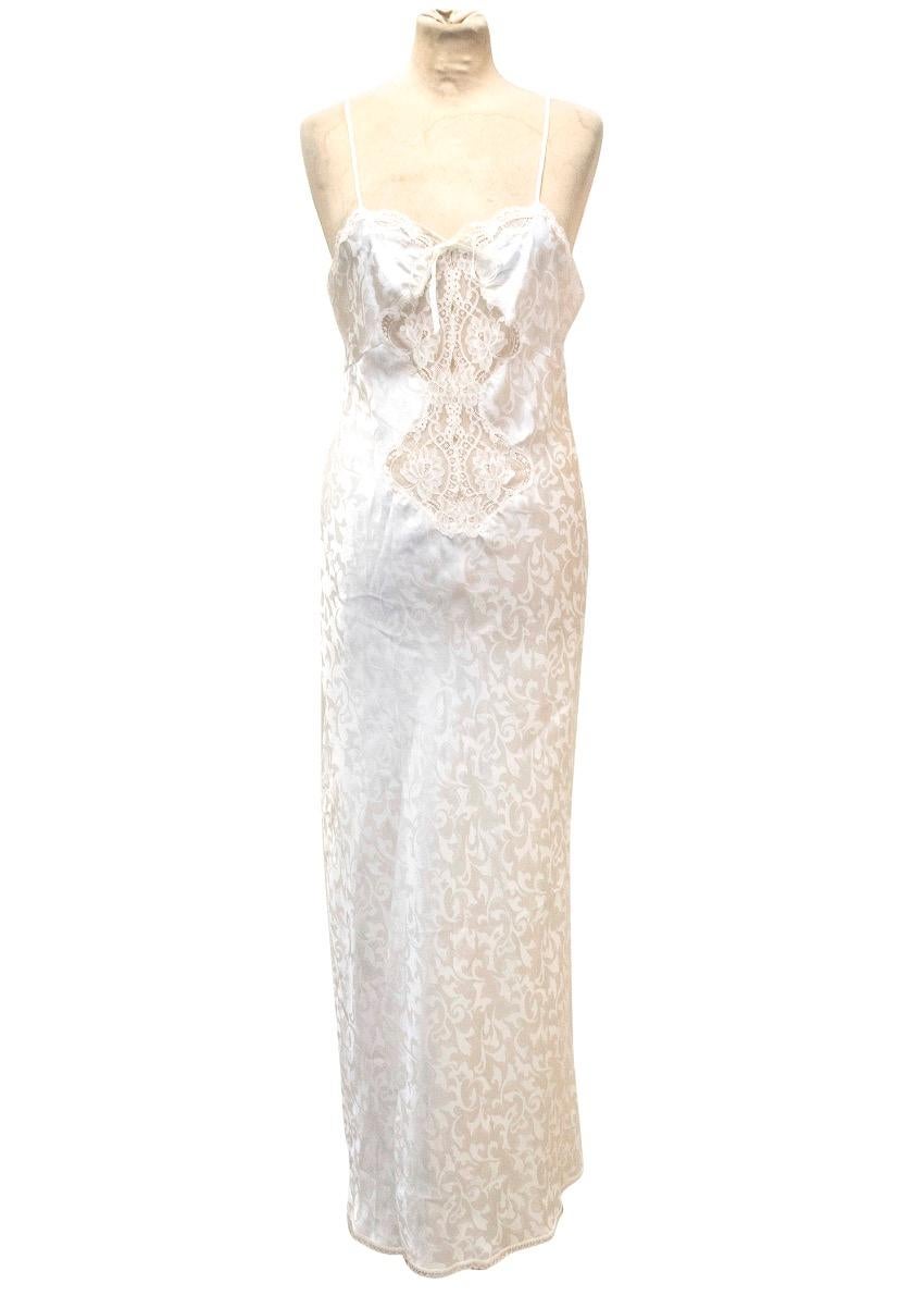 Dior cream, floral printed night gown and robe set, featuring lace detail along the bust and torso of the gown and along the shoulders,bust, back and cuffs of the robe. 

Please note, these items are pre-owned and may show signs of being stored even