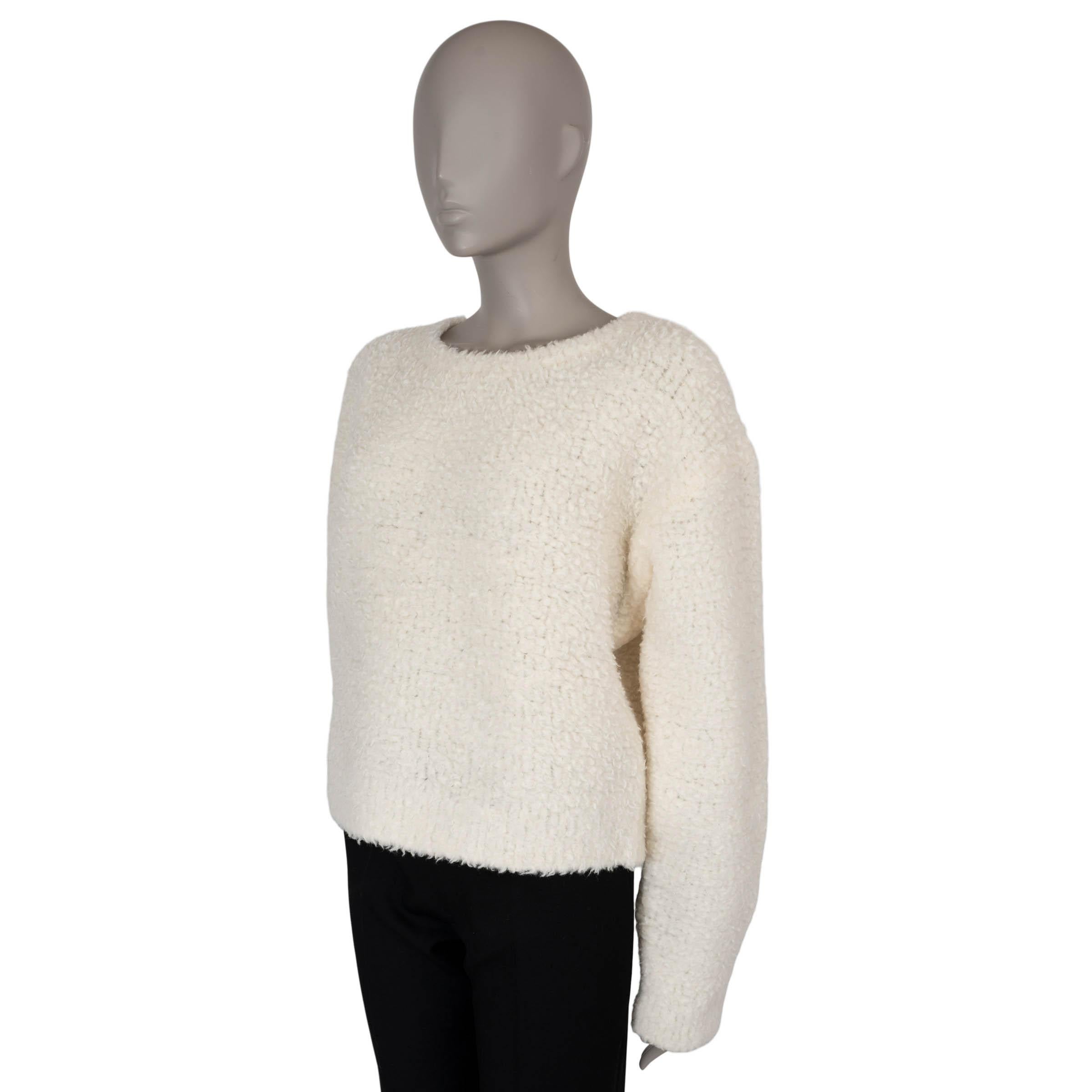 Ce pull Teddy 100% authentique Christian Dior en laine crème (85%) et polyamide (15%) offre une silhouette douillette et surdimensionnée avec une coupe boxy et des épaules tombantes pour un look décontracté et chic. Il présente un col rond et le