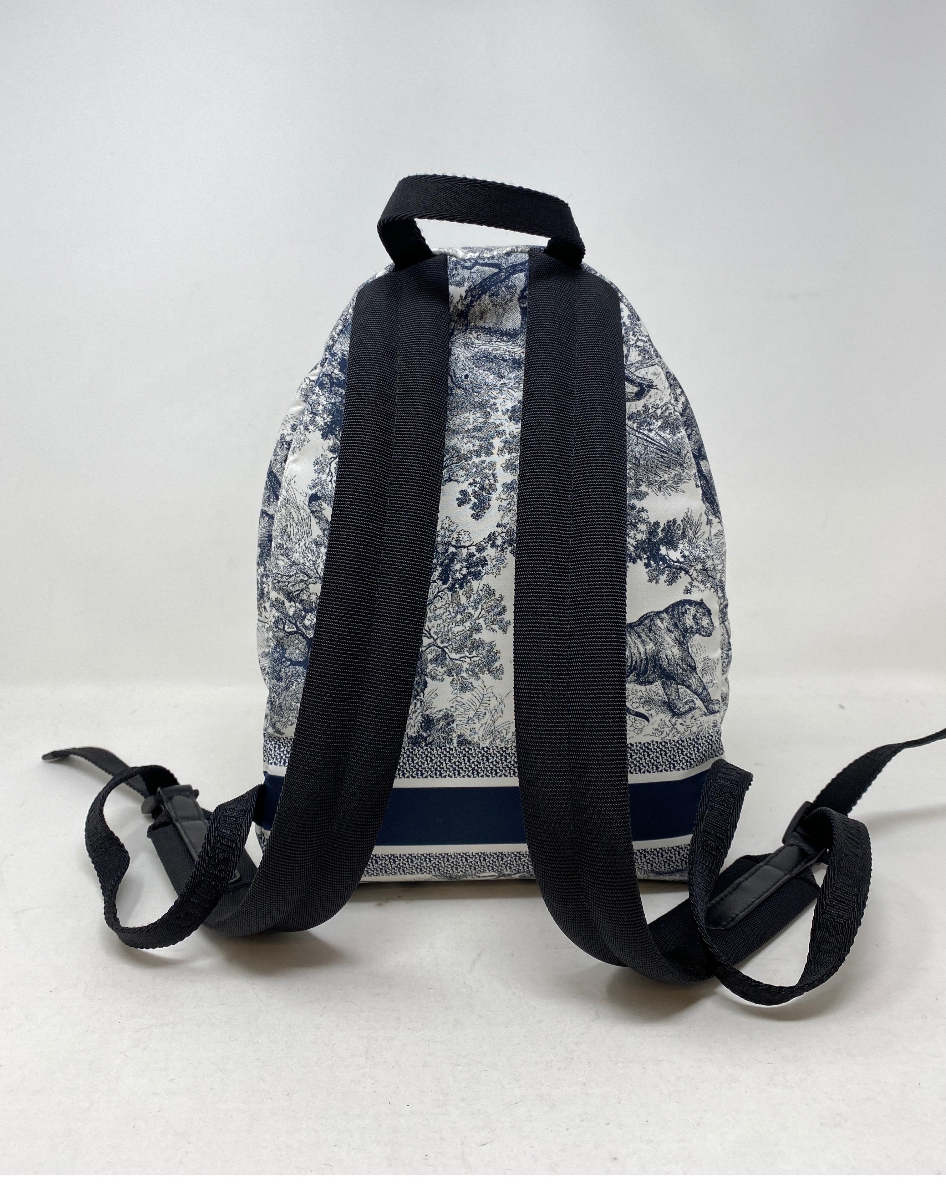 Christian Dior Cruise Backpack. Rare design backpack. Limited collection. Navy and white design. Animal motif. Small size backpack. Excellent condition. Guaranteed authentic. 