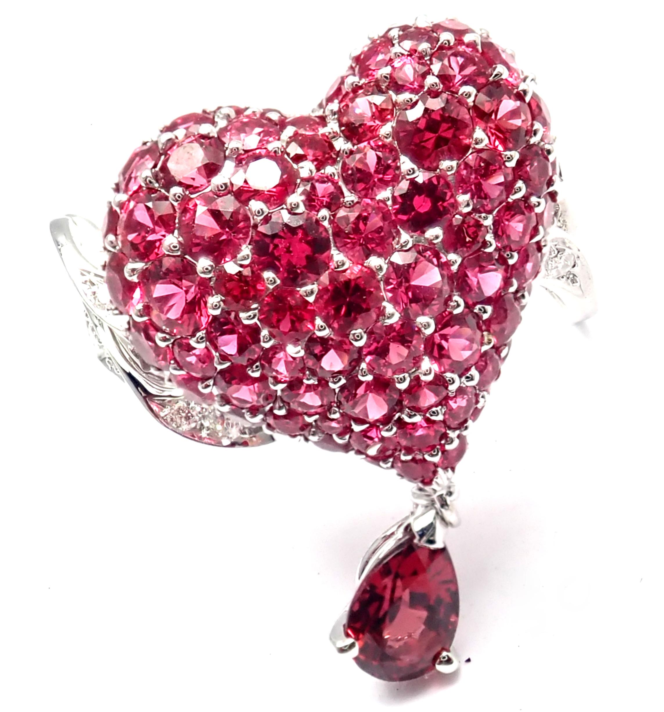 18k White Gold Cupidon Diamond Ruby Red Spinel Heart Shape Ring by Christian Dior. 
With round brilliant cut diamonds VS1 clarity, G color total weight approximately 0.90ctw
red rubies and red spinel.
Details: 
Size: EU 53, US 6.25
Weight: 6.1