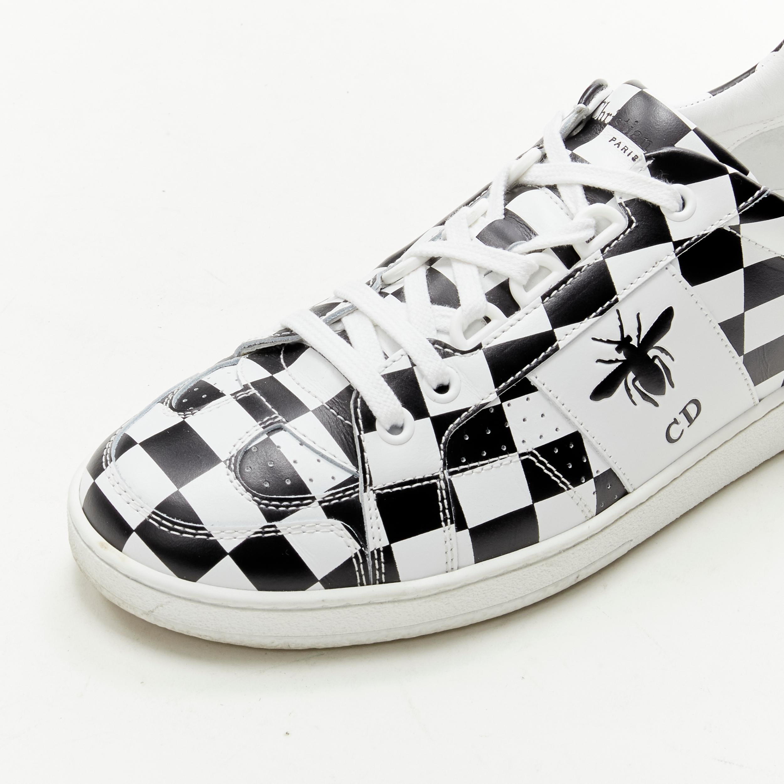 CHRISTIAN DIOR D-Bee black white checker CD BEE logo low top sneaker EU36 
Reference: ANWU/A00340 
Brand: Christian Dior 
Model: D-Bee 
Material: Leather 
Color: White 
Pattern: Checkered 
Closure: Lace 


CONDITION: 
Condition: Very good, this item