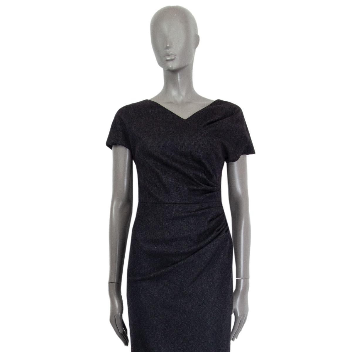 100% authentic Christian Dior short sleeve ruched details sheath dress in dark grey wool (90%), angora (8%) and lycra (2%) with a v-neck. Closes on the back with a concealed zipper. Lined in silk (94%) and lycra (6%). Has been worn and is in