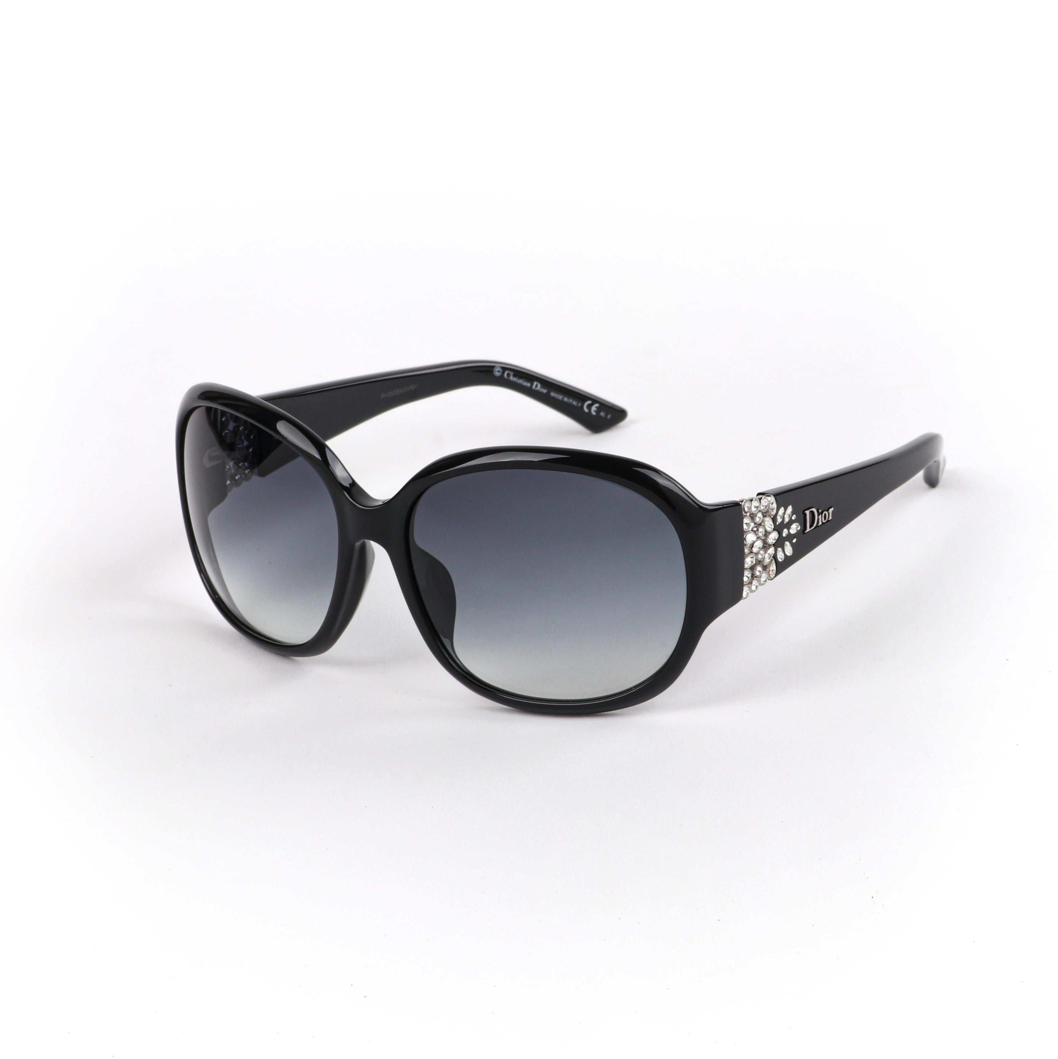 CHRISTIAN DIOR “Delicacy F” Ltd Ed. Black Swarovski Crystal Oversized Sunglasses w/Box
 
Brand/Manufacturer: Christian Dior
Circa: 2014
Style: Oversized sunglasses
Color(s): Black; Crystals: White/Clear
Lined: No
Unmarked Materials (feel of):