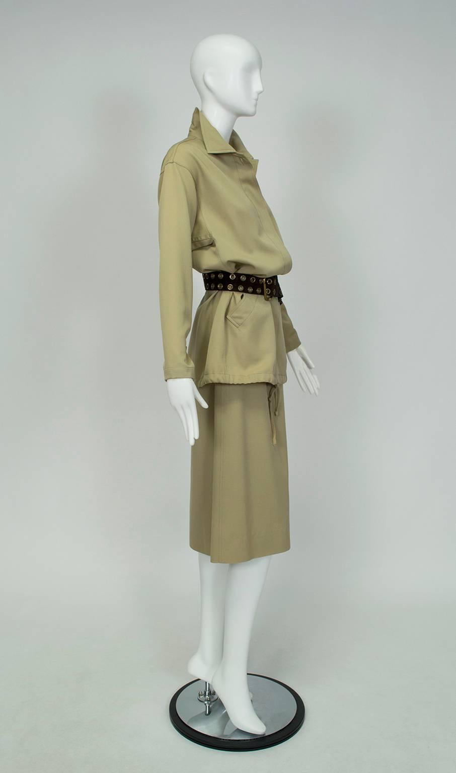 Designed by Marc Bohan, this comfortable and practical skirt suit carried the torch Yves Saint Laurent ignited when he introduced the world to prêt-a-porter in the late 60s. Beautifully cut and finished, it may be worn bloused with a cinched