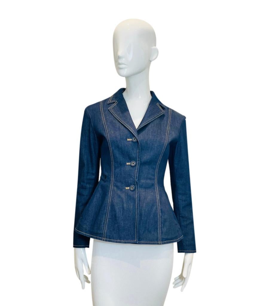 Christian Dior Denim Bar Jacket With Bee Embroidery
Navy cotton jacket/blazer detailed with cinched waist leading to structured flared hemline and contrast stitching.
Featuring Dior's signature 'Bee' embroidery to the side, notched lapels and