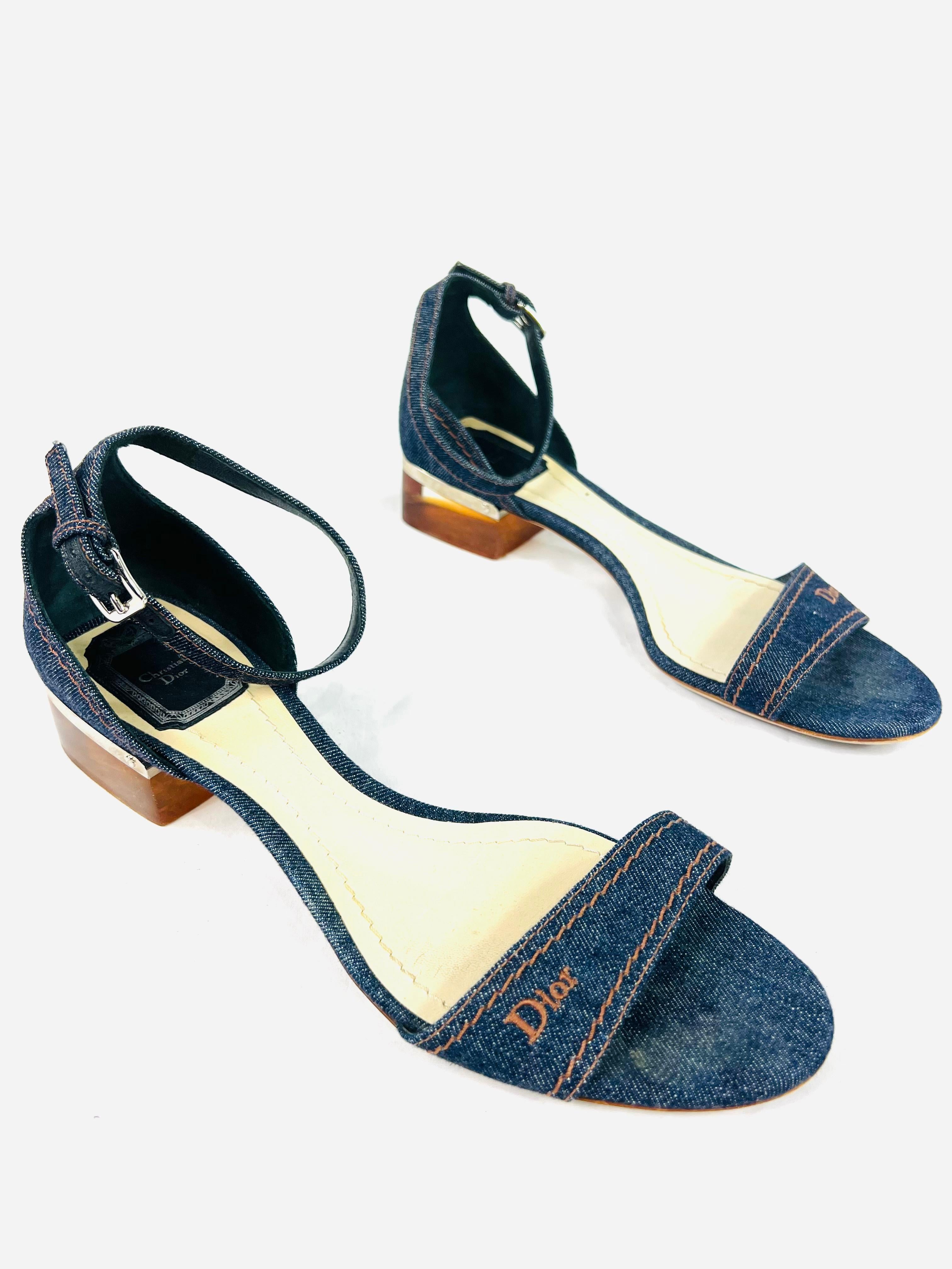 Product details:

The shoes are made out of dark wash denim with brown acrylic heel, that is 1.5” high and silver tone adjustable buckle closure.