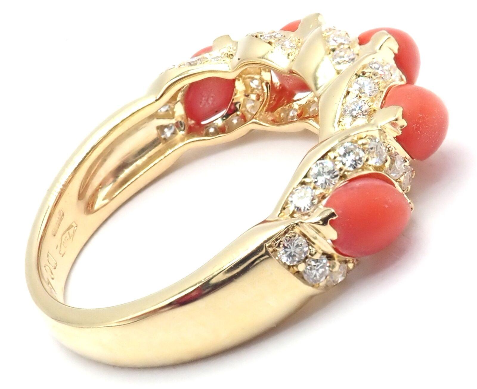 18k Yellow Gold Diamond Coral Band Ring by Christian Dior. 
With 48 round brilliant cut diamonds VS1-SI2 clarity, E-G color total weight approximately .49ct
5 coral stones
Details:
Ring Size: 6
Weight: 5.3 grams
Width: Band is 8mm
Stamped Hallmarks: