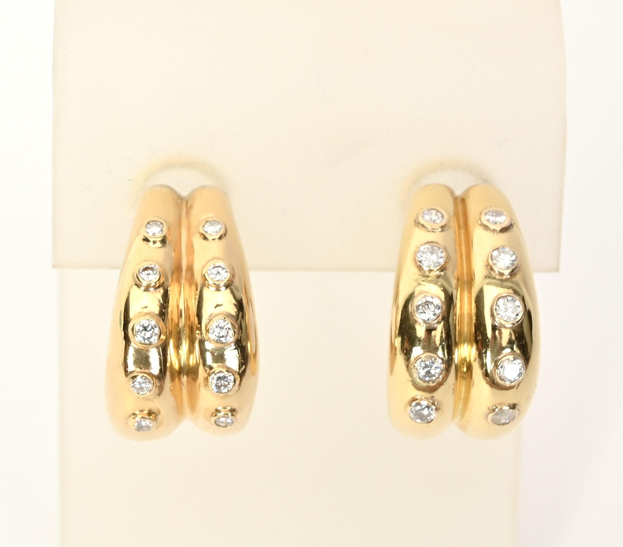 Chic  18 karat gold hoop diamond earrings by Christian Dior. They measure 7/8