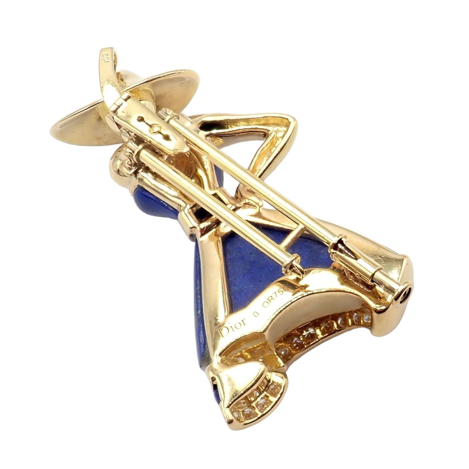 The Authentic! Christian Dior 18k Yellow Gold Diamond Lapis Lady Dior Brooch / Pendant is a truly exceptional piece of jewelry. Crafted from 18k yellow gold, it radiates luxury and elegance. The brooch features a captivating lapis lazuli