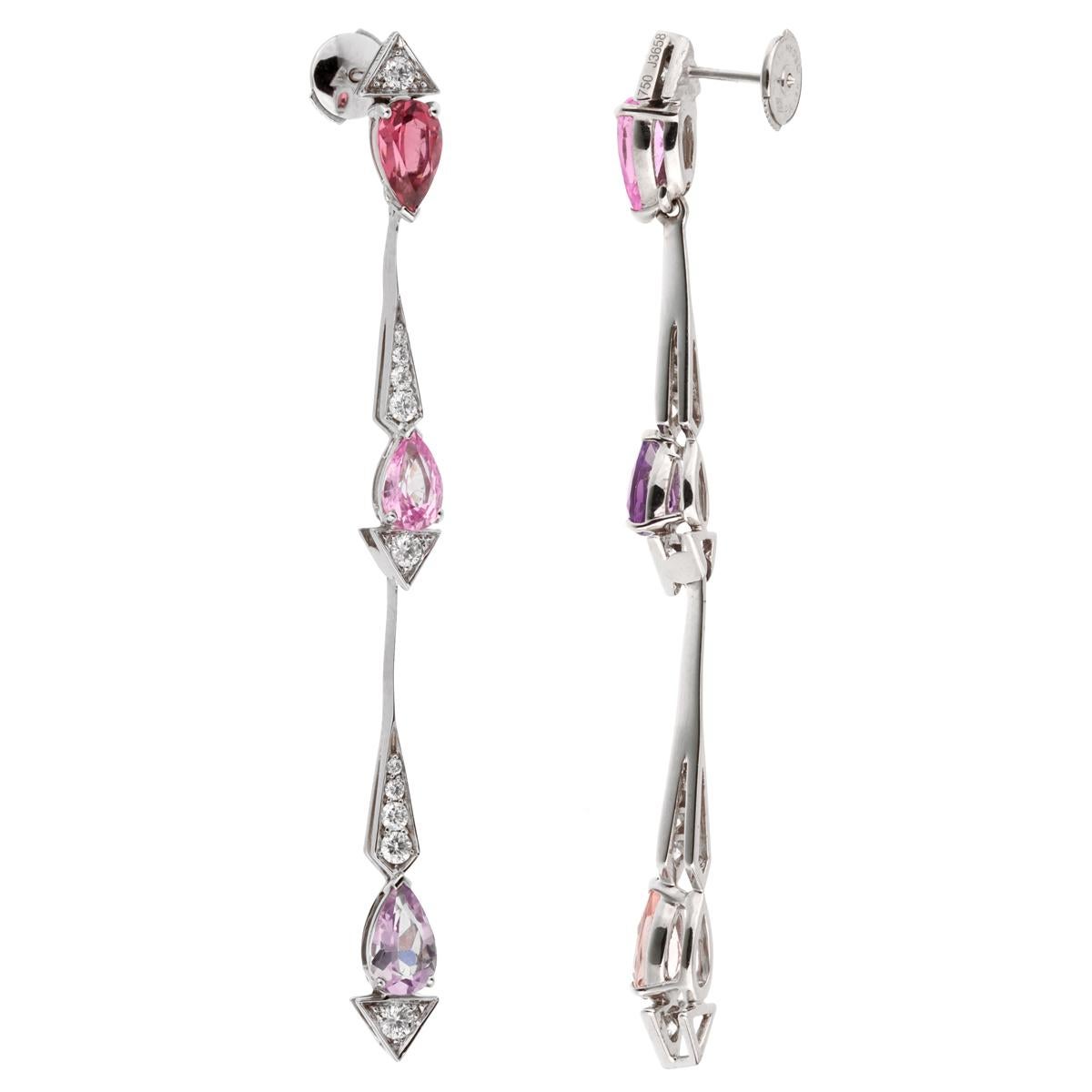 A chic set of Christian Dior diamond earrings showcasing Pink Sapphires, Amethyst, and Tourmaline set in 18k white gold. The earrings measures 2.75