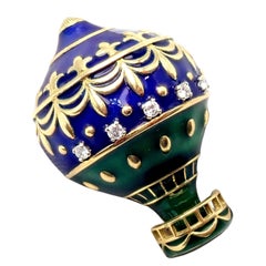 Christian Dior Broche ballon en or jaune émaillé et diamants