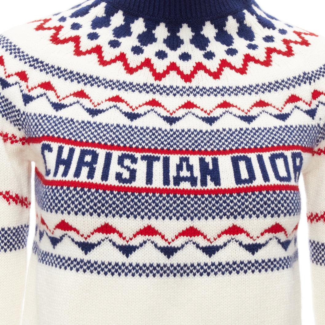CHRISTIAN DIOR Dioralps cream wool cashmere logo star fairisle sweater FR34 XS
Reference: AAWC/A01093
Brand: Dior
Designer: Maria Grazia Chiuri
Collection: Dioralps
Material: Virgin Wool, Cashmere
Color: Cream, Blue
Pattern: Fair Isle
Closure: