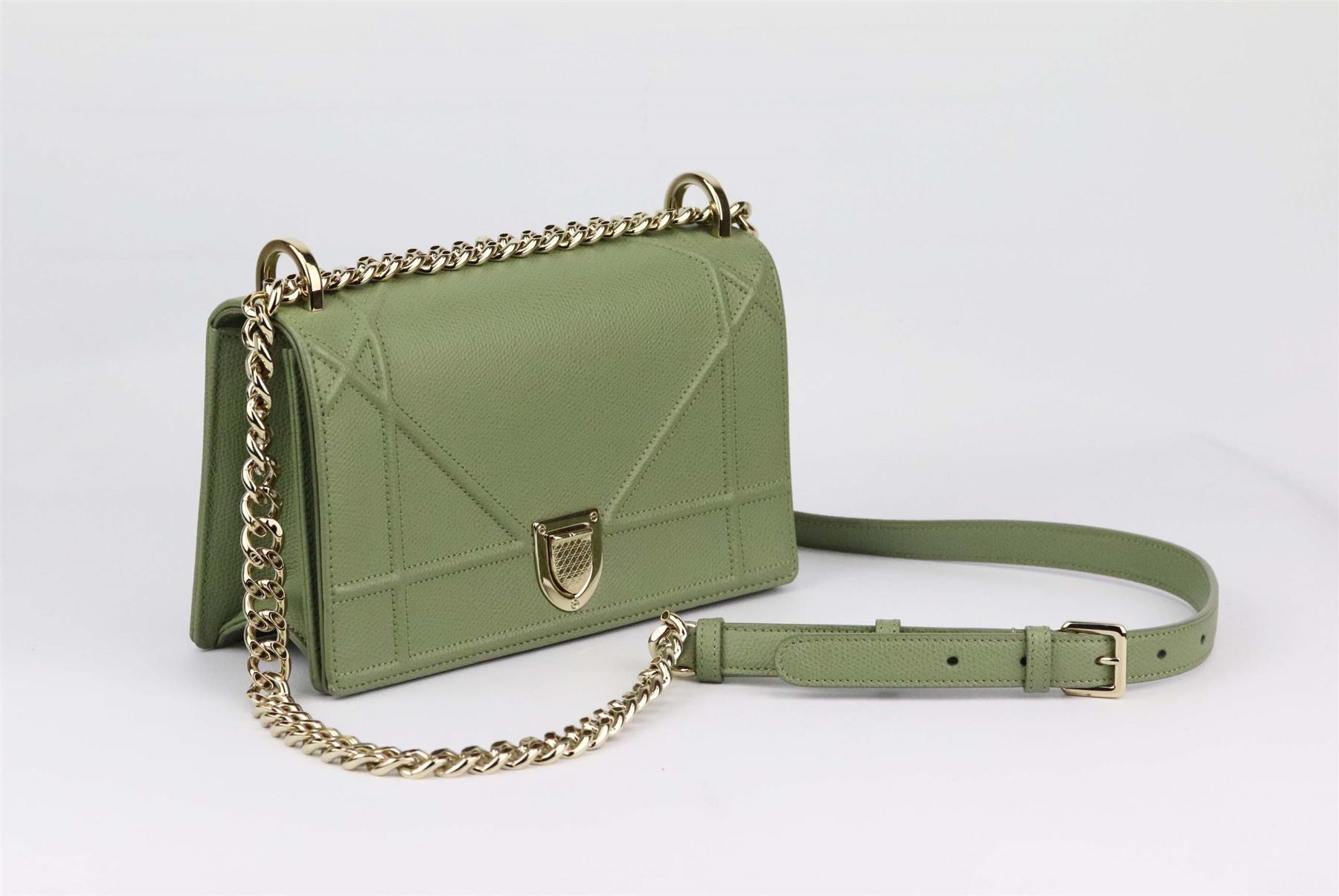 Christian Dior reinterprets its iconic Cannage design as a khaki Diorama flap bag – one of the favourite silhouettes, in the signature leather technique, the khaki calfskin leather has a structured shape and secured with a fold-over magnetic