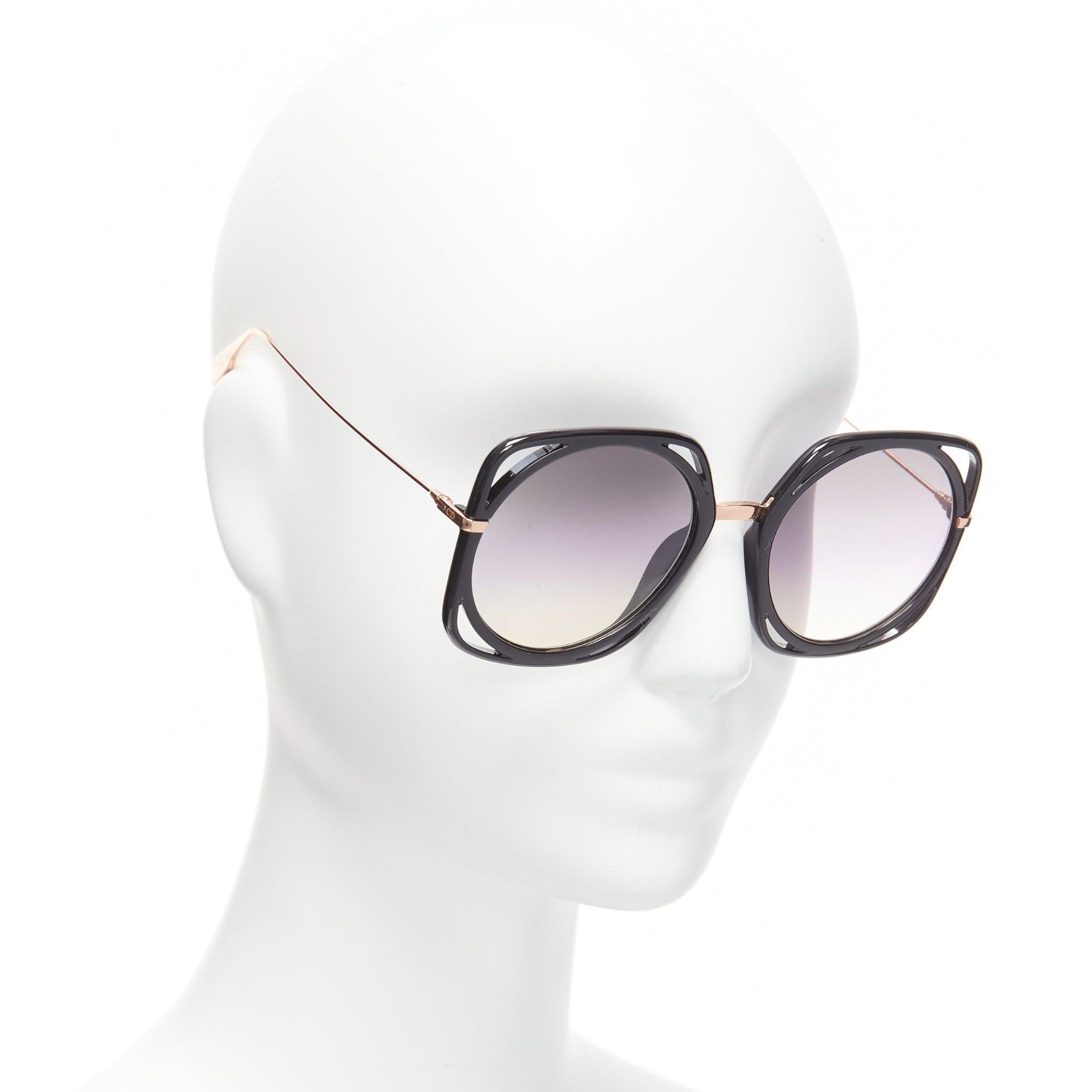 Grigio CHRISTIAN DIOR DiorDirection occhiali da sole oversize con montatura nera e lenti viola in vendita