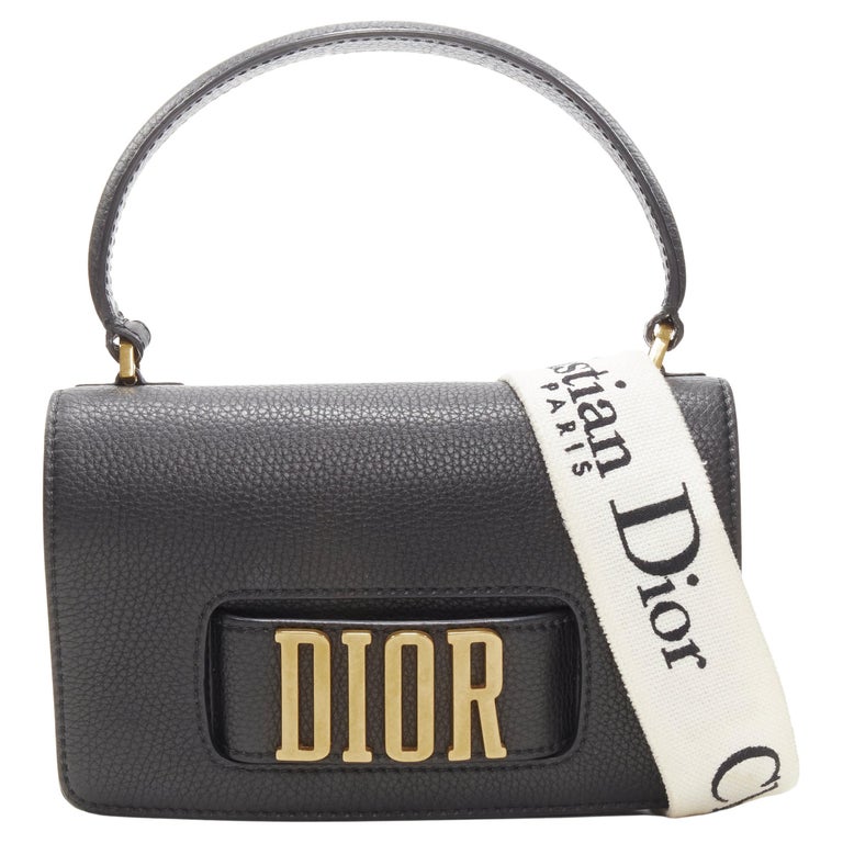 CHRISTIAN DIOR Diorevolution black gold leather logo canvas strap top handle  bag For Sale at 1stDibs
