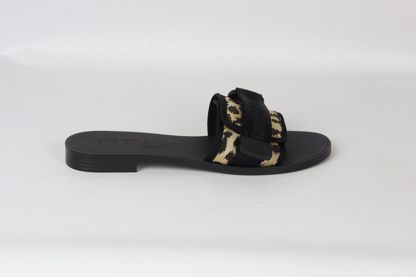 Christian Dior Dio(r)evolution leopard jacquard satin slides. Black, beige and brown. Slip on. Does not come with dustbag or box. Size: EU 38 (UK 5, US 8). Insole: 9.6 in. Heel Height: 0.6 in. New without box