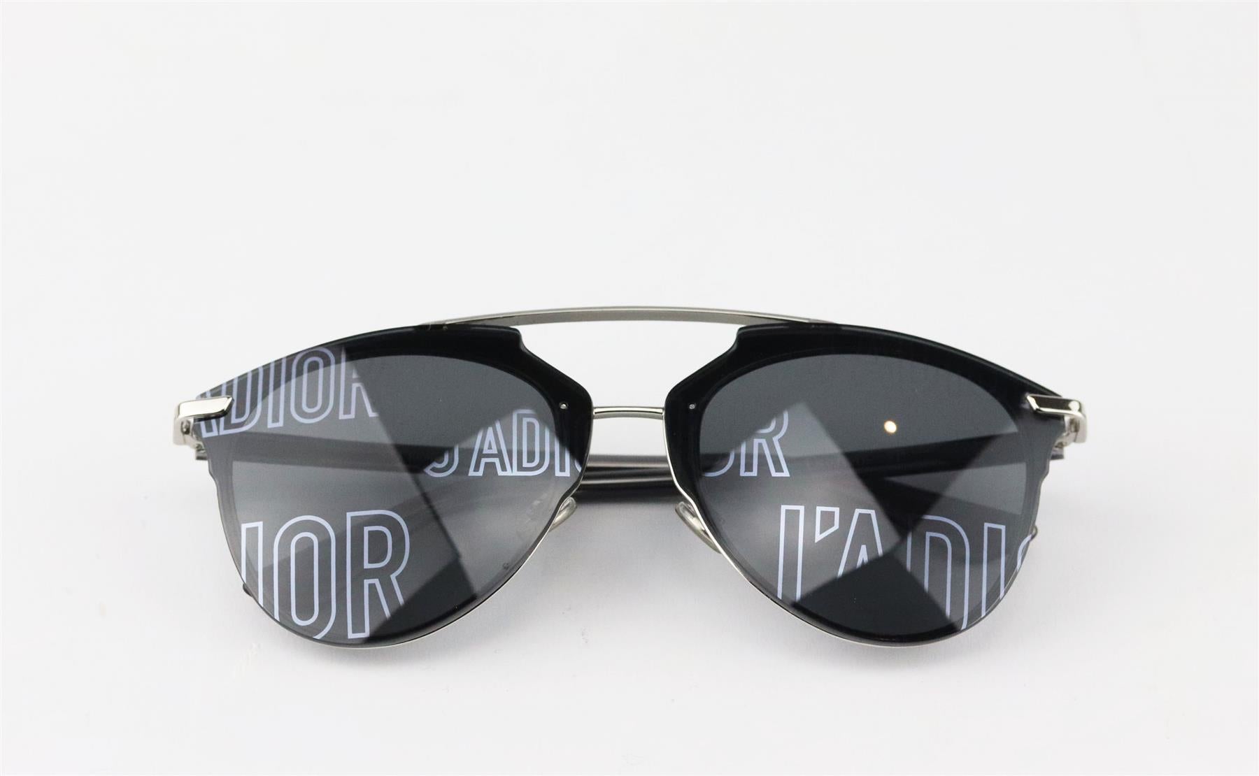 These Christian Dior ‘DiorReflectedP’ sunglasses are unmistakably Dior - it's impossible to miss the mirrored 'J’ADIOR’ motifs, they're made from silver-tone metal and have vintage-inspired round frames. 
Grey acetate, silver-tone metal. 
100% UV