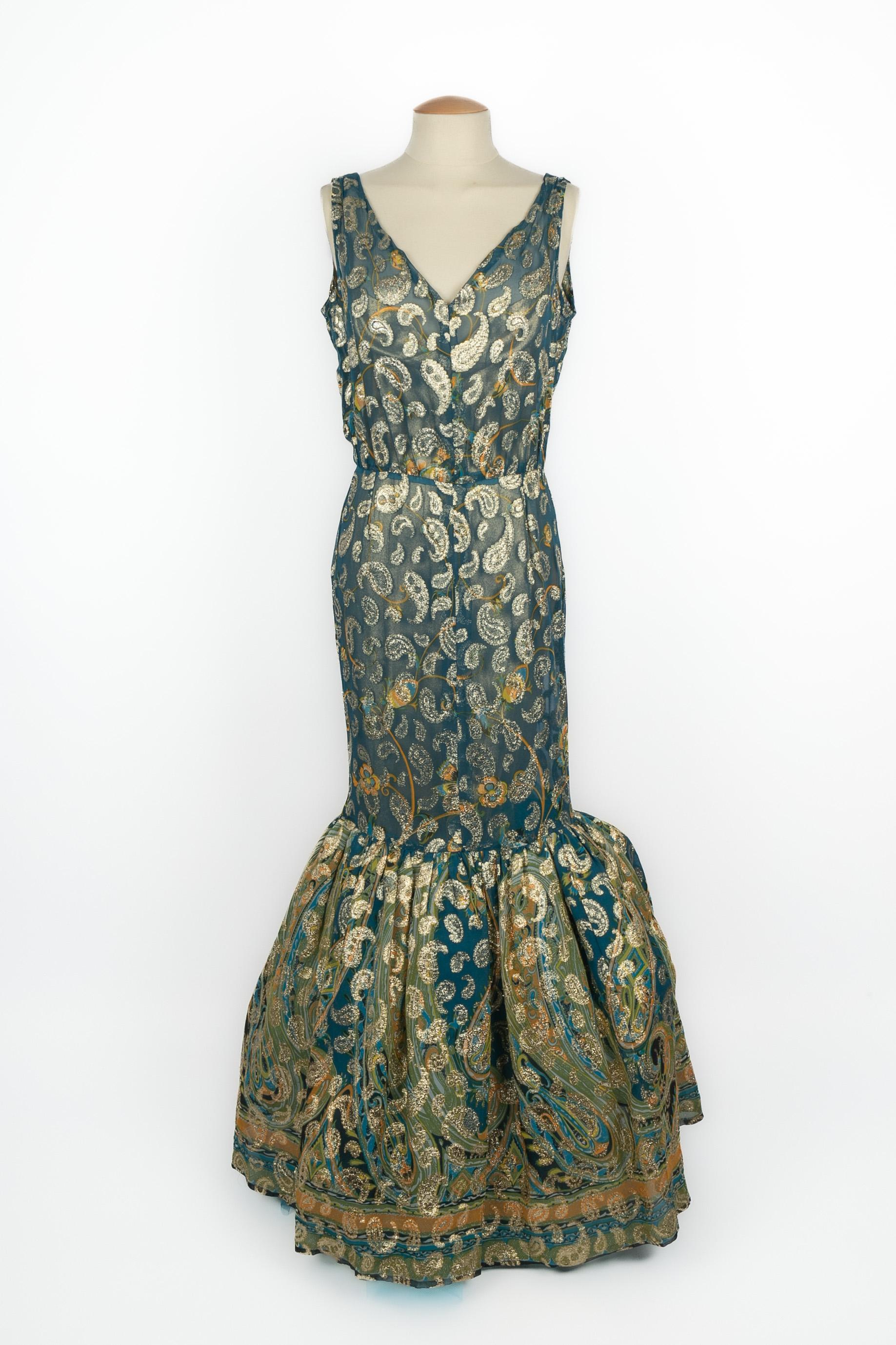 DIOR - (Made in France) Teal veil evening dress with golden lamé buta decoration, wide flounces with a tulle lining on the bottom. Golden lamé slipdress. No size indicated, it fits a 36FR/38FR. 1969 Haute Couture Collection, under the artistic