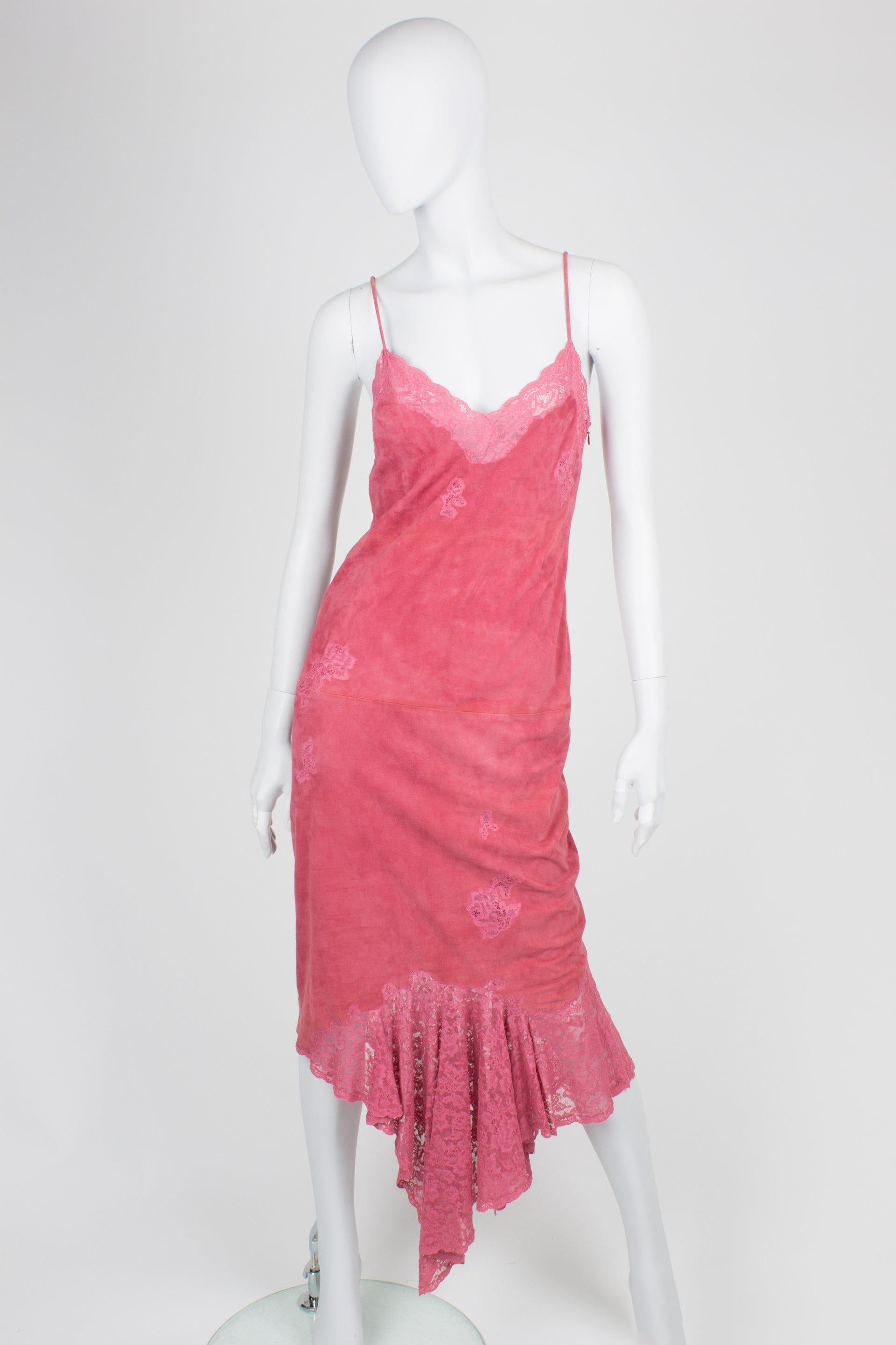 Long evening gown with matching jacket by Christian Dior made of pink suede and lace.

The dress has spaghetti straps and invisible zip closure on the left. The lace garnish is mainly applied at the top and the bottom. Fully lined with pink