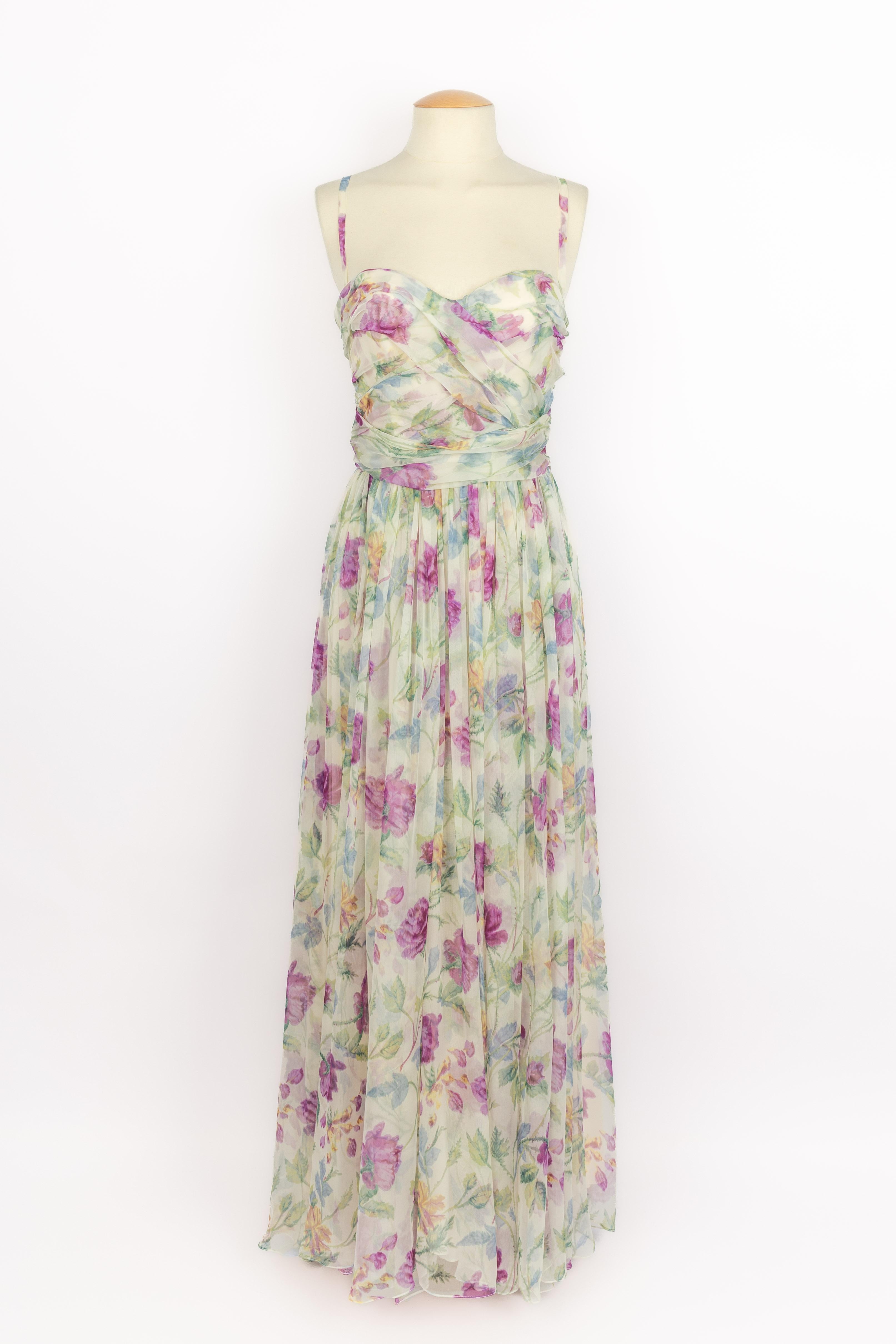 DIOR - (Made in France) Silk bustier dress with drapery and printed with a flower pattern on a white background. Size 36FR indicated. 2008 Fall-Winter Collection under the artistic direction of John Galliano.

Condition:
Very good
