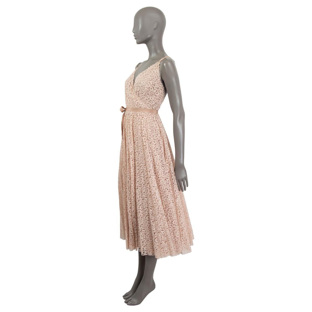 100% authentic Christian Dior Spring/Summer 2019 lace embellished wrap dress in dusty rose cotton (77%) and polyamide (23%). Features a deep v-neck and opens with a button and a belt at the front. Lined in dusty rose silk (100%). Has been worn once