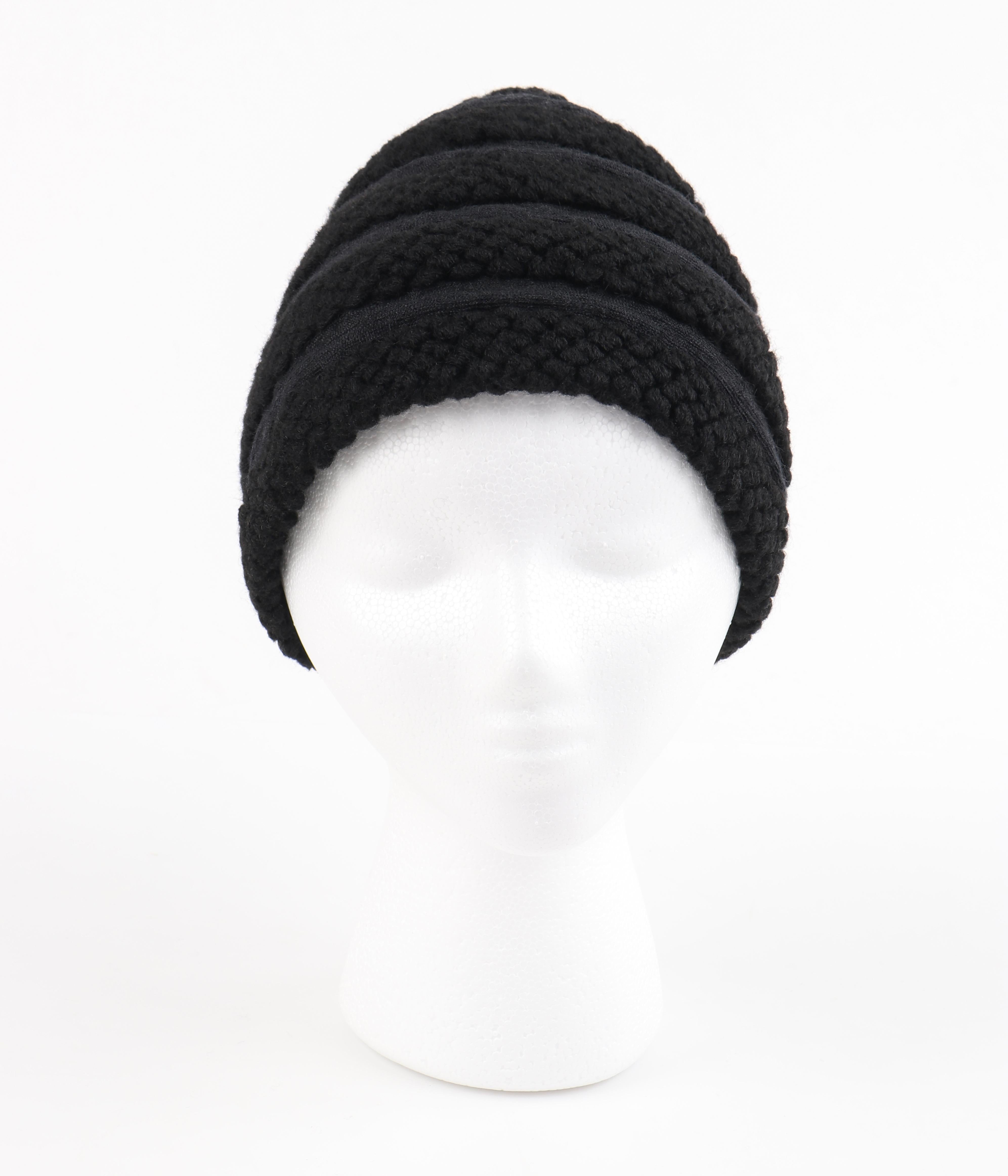 CHRISTIAN DIOR Early c.1960’s Couture Black Crochet Knit Layered Cap Hat 
 
Circa: Early 1960’s
Label(s): Christian Dior / New York
Style: Knit Hat
Color(s): Black
Lined: Yes 
Unmarked Fabric Content: Wool
Additional Details / Inclusions: Black
