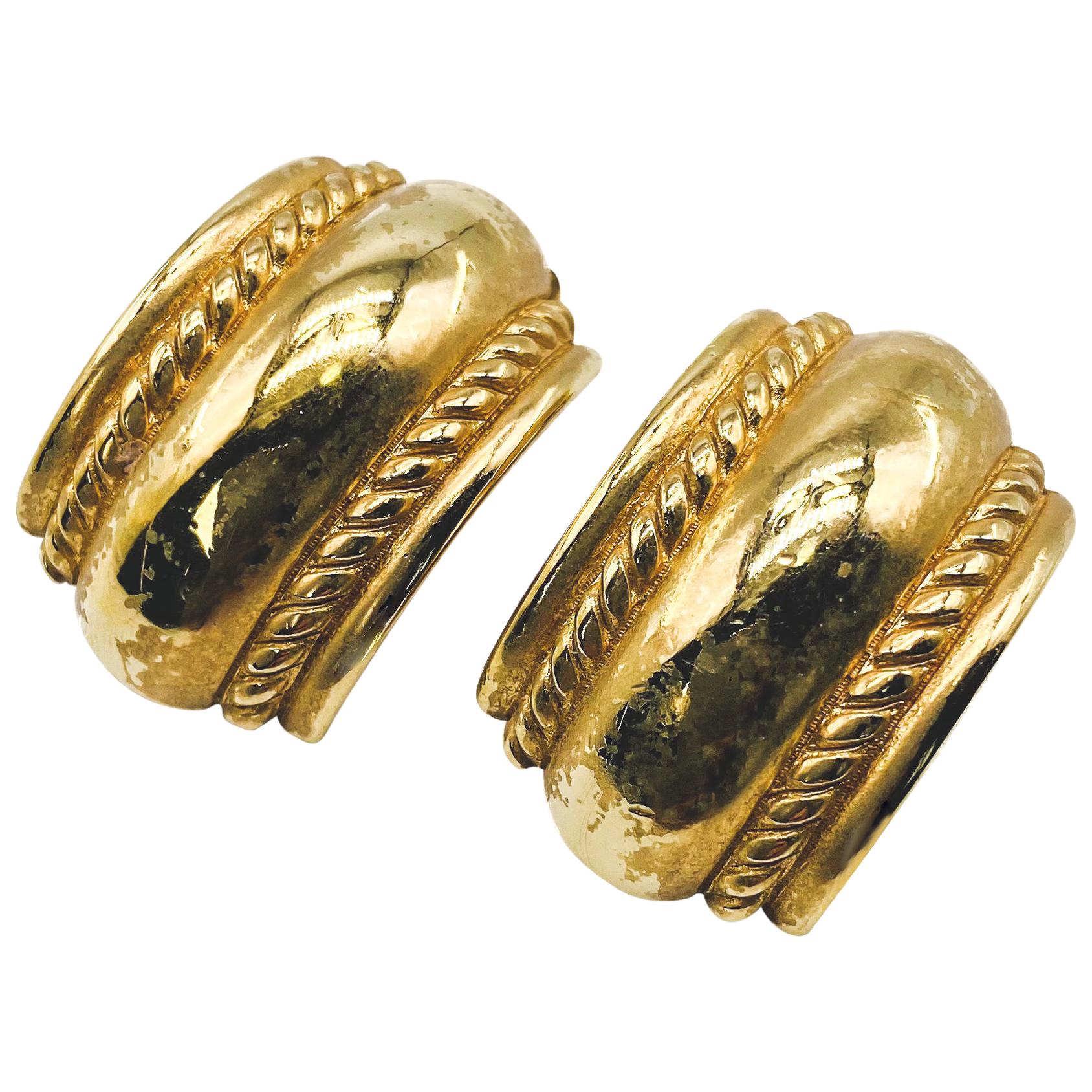 A pair of vintage Christian Dior clip on earrings gold tone and paste half  hoop design stamped ea