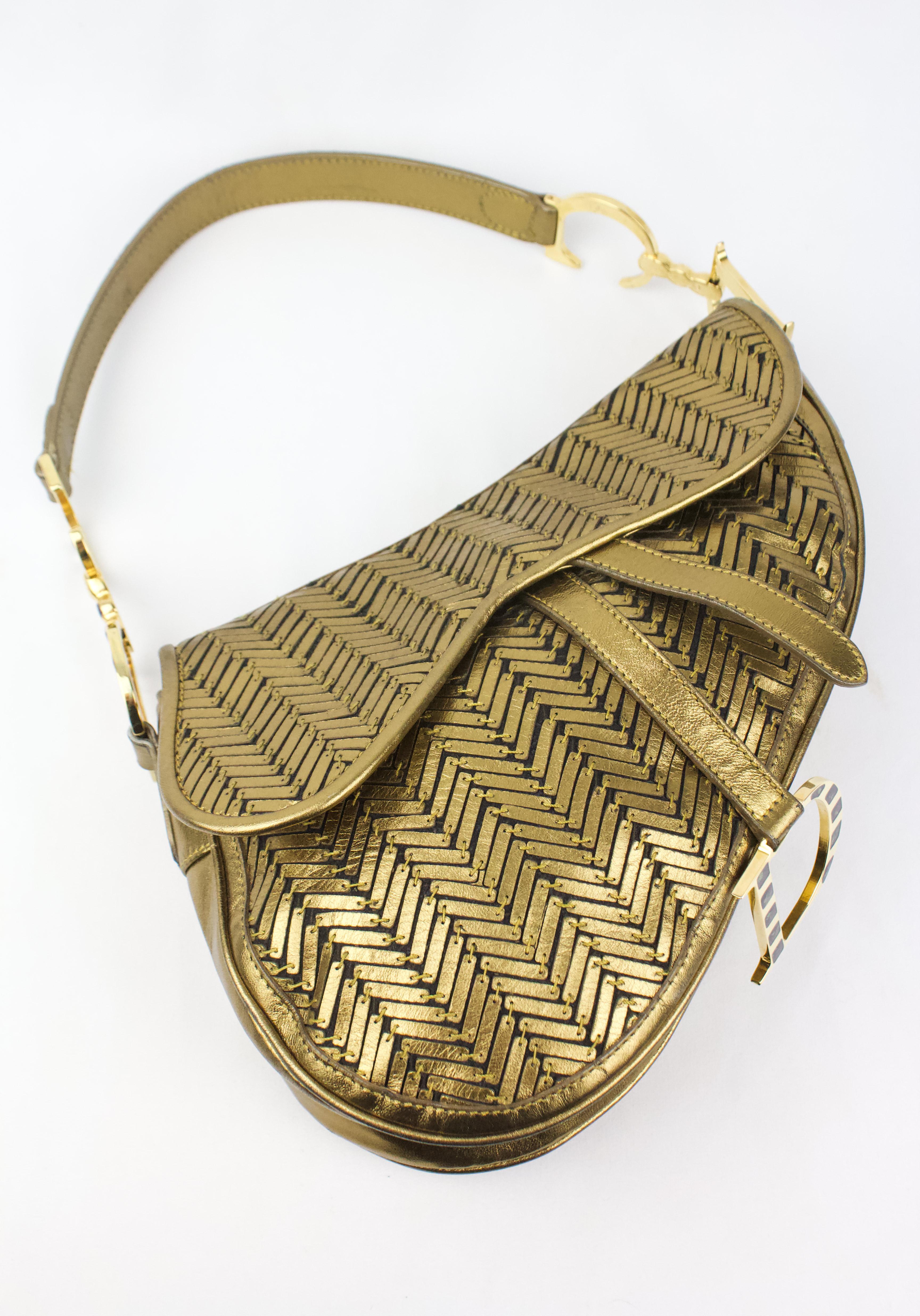 Vintage Christian Dior saddle bag, extremely limited edition of only 100 ever made, to celebrate John Galliano's 10th year as creative director for Dior produced in 2006. The collection featured 12 models of saddle bags representing different