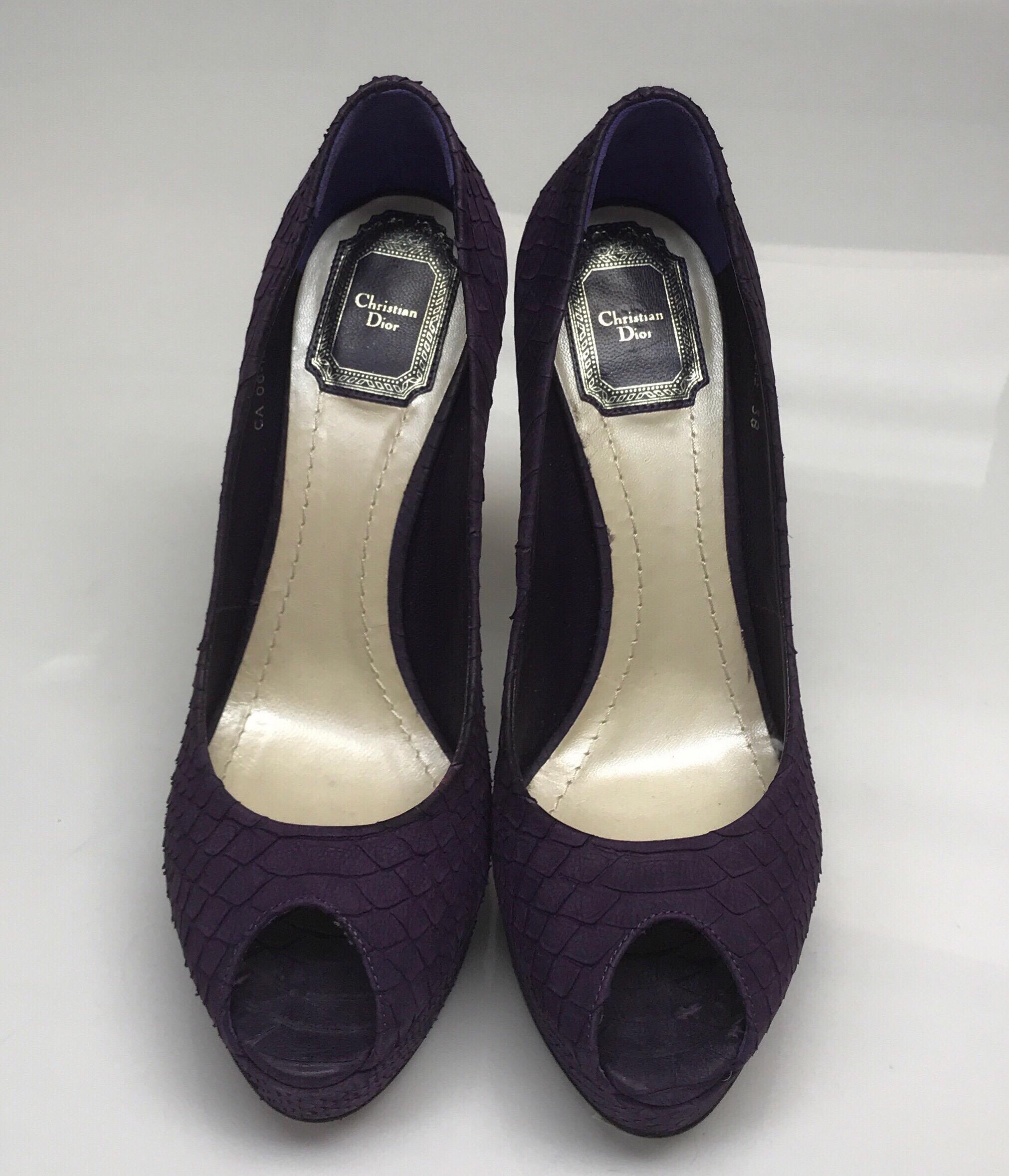 Christian Dior Embossed Leather Purple Platform Heels-38. These amazing Christian Dior heels are in great condition. They show barley any sign of use, with exception to the bottom of the shoe. They are made of purple leather in a snake skin embossed