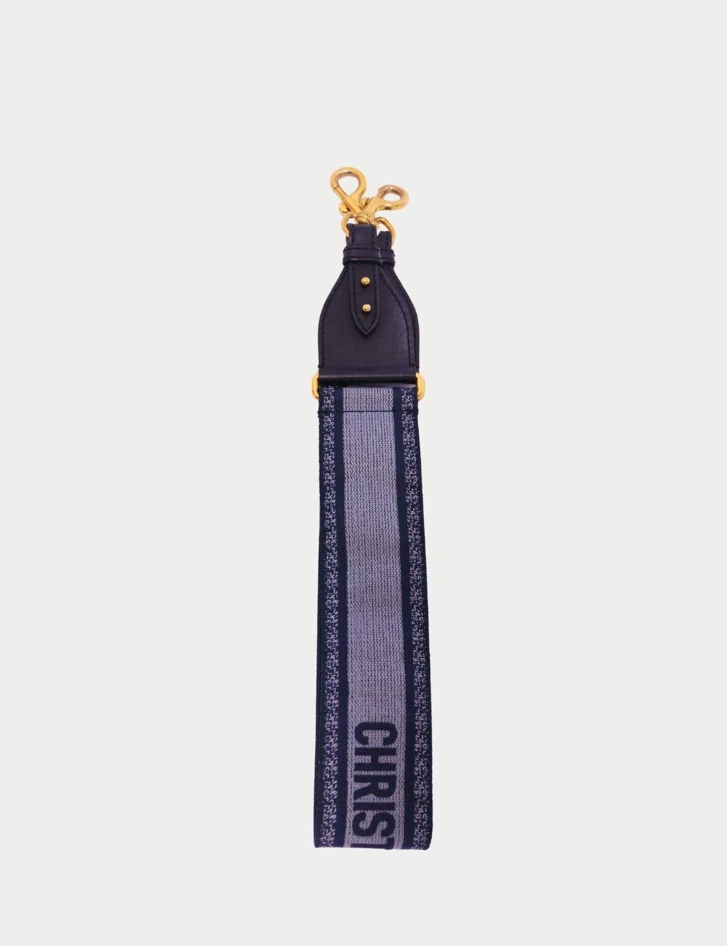 Christian Dior Embroidered Shoulder Strap – Navy & Grey Adjustable Bag Strap

Elevate your handbag with this iconic Christian Dior embroidered shoulder strap, crafted in a chic navy and grey colorway. Designed with the signature “Christian Dior”