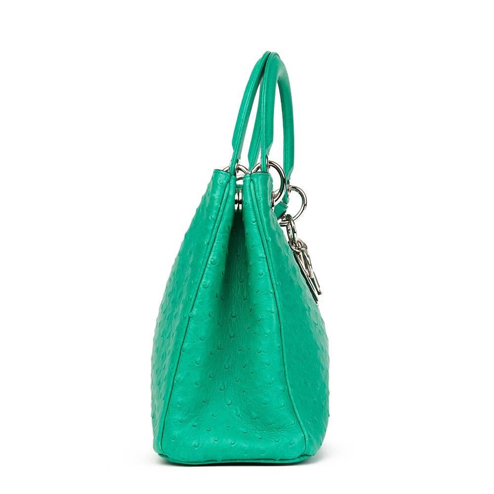 CHRISTIAN DIOR
Emerald Ostrich Leather Diorissimo MM

Reference: HB1751
Serial Number: 09-MA-0123
Age (Circa): 2013
Accompanied By: Dior Dust Bag, Shoulder Strap, Interior Pouch
Authenticity Details: Serial Stamp (Made in Italy)
Gender: Ladies
Type: