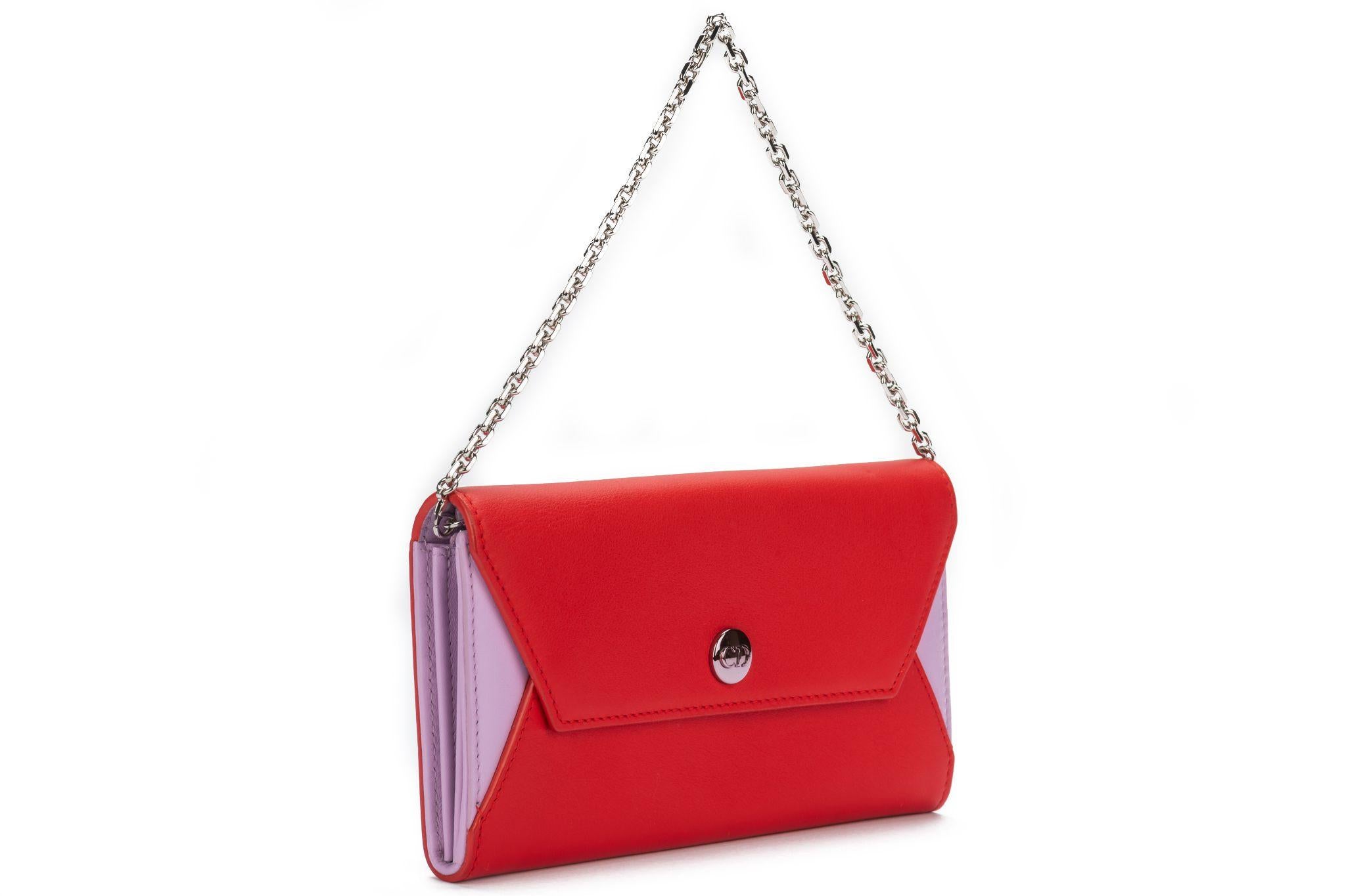 Christian Dior Envelope Wallet On Chain in red and pink leather. Comes with a detachable chain which measures 5 inches. It's new and includes the original dustcover.