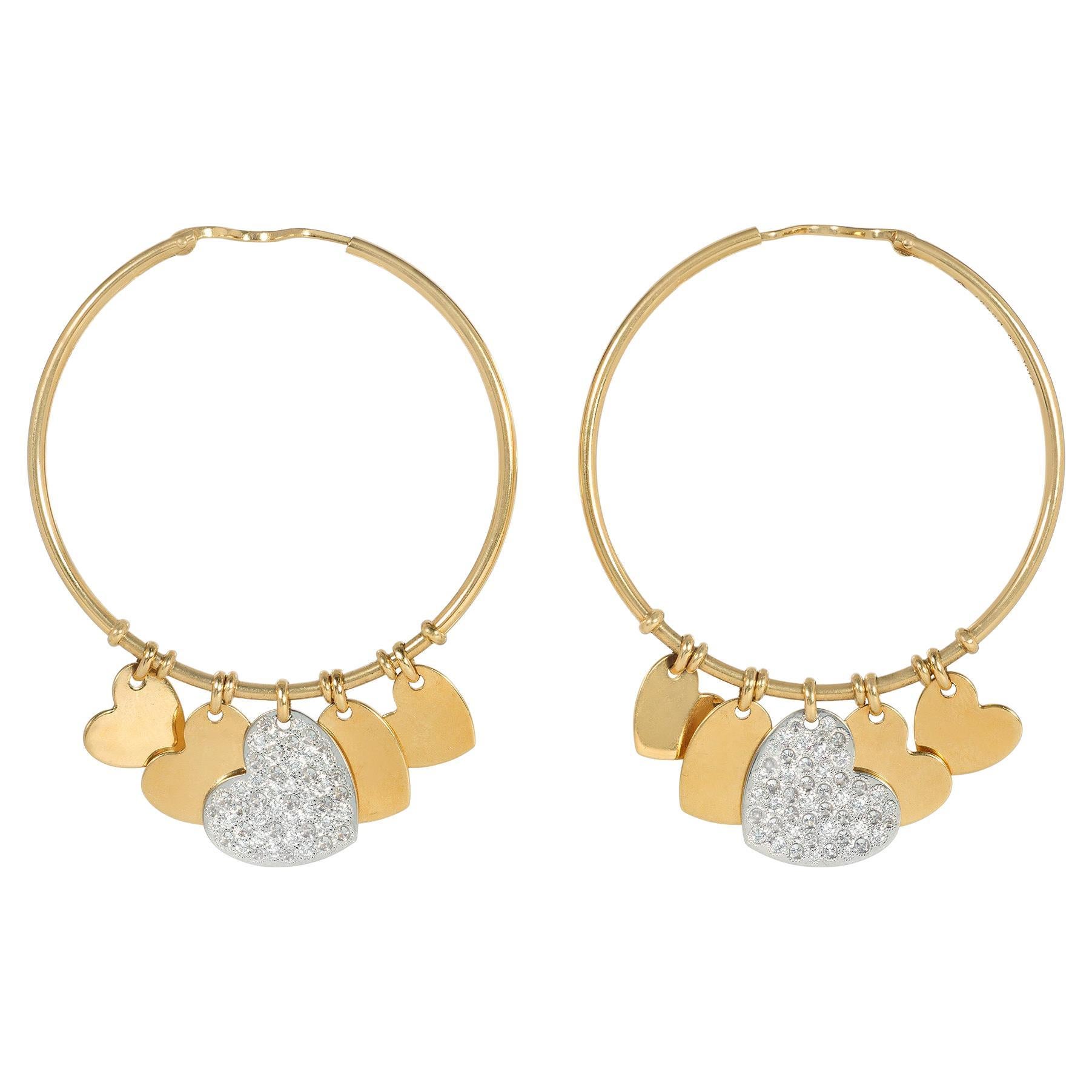 Christian Dior, boucles d'oreilles en or et diamants avec pendentifs en forme de cœur