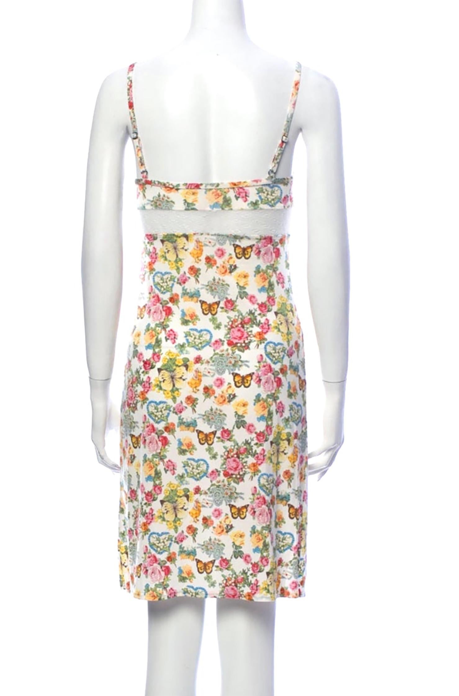Christian Dior floral slip dress with lace insert, has stretch. Synthetic blend fabric.  Condition: Excellent. Size XS, FR 34, US 2

29