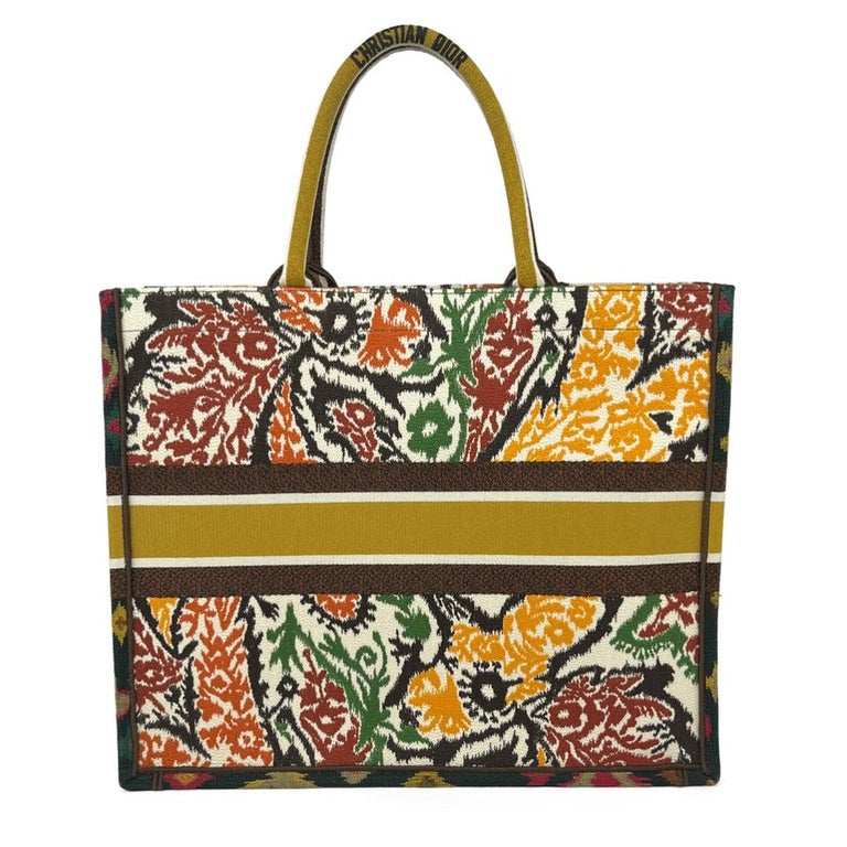 New multicolor tribal print signature Christian Dior large tote bag, 'CHRISTIAN DIOR PARIS' signature on the front. In mint condition. Includes original dust bag