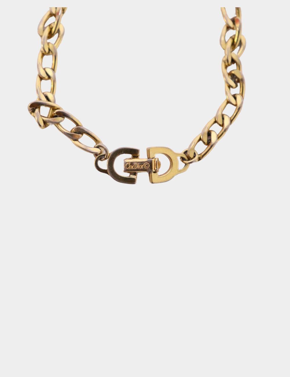 Elevate your jewelry collection with this vintage Christian Dior Chain Link Bracelet. Crafted in radiant gold-tone metal, this elegant piece features classic oval chain links and a signature 'CD' logo clasp, reflecting Dior's timeless