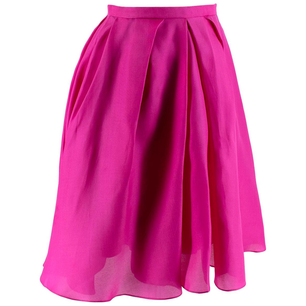 Christian Dior Fuchsia Pink Skirt

- Silk blend with diamond weave
- Hidden side zip 
- Knee length
- Pleated floaty skirt
- Slightly glossy finish to the silk
- UK 8

Made in Italy

Fabric Composition:
100% Silk

Measurements are taken laying flat,
